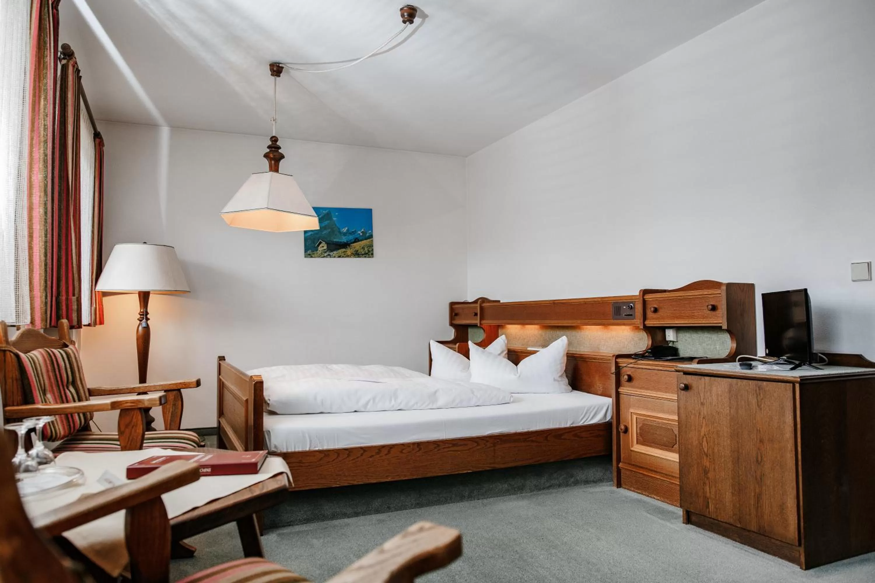 Bed in Hotel Vier Jahreszeiten