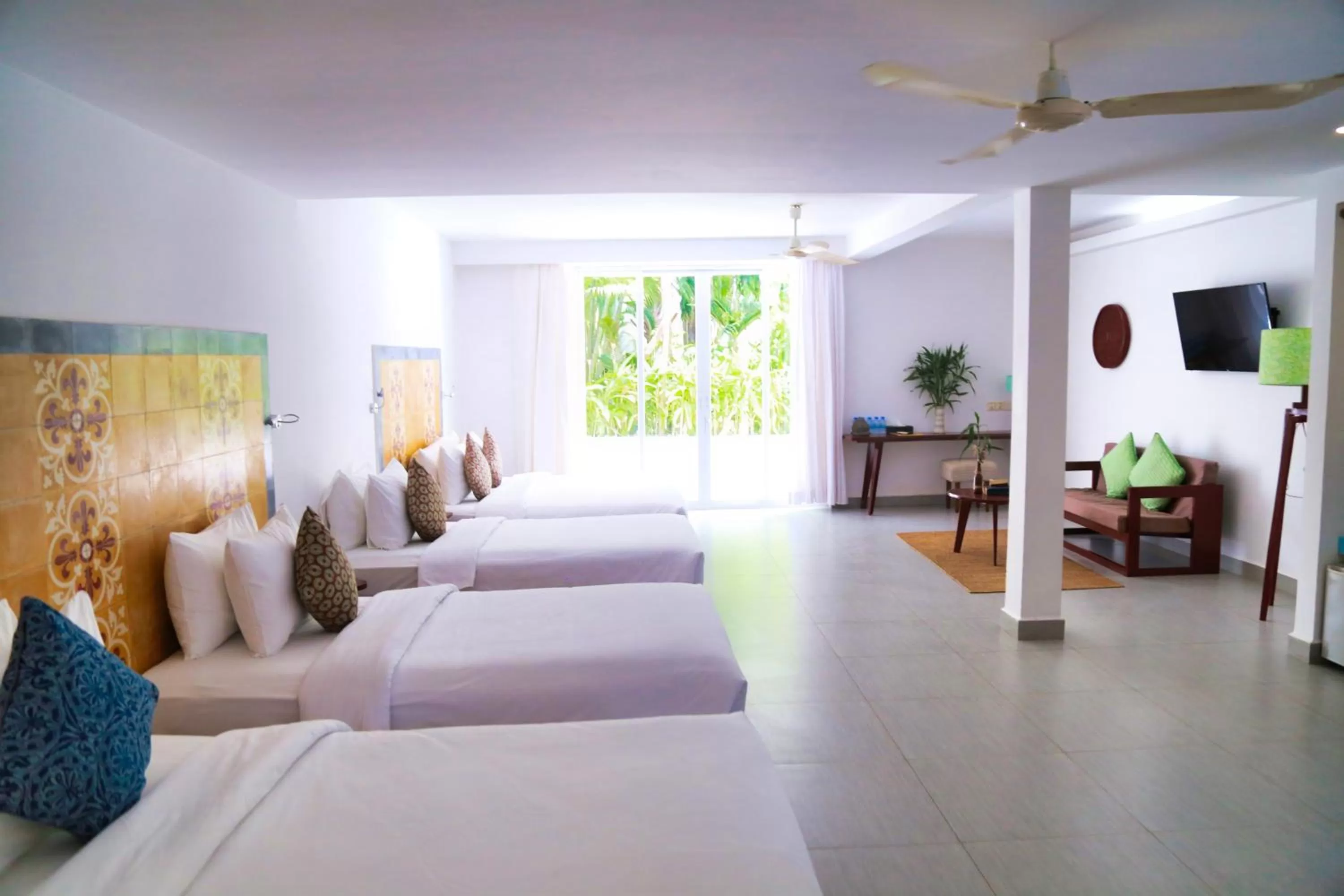 Communal lounge/ TV room, Bed in Naiya Sea Resort