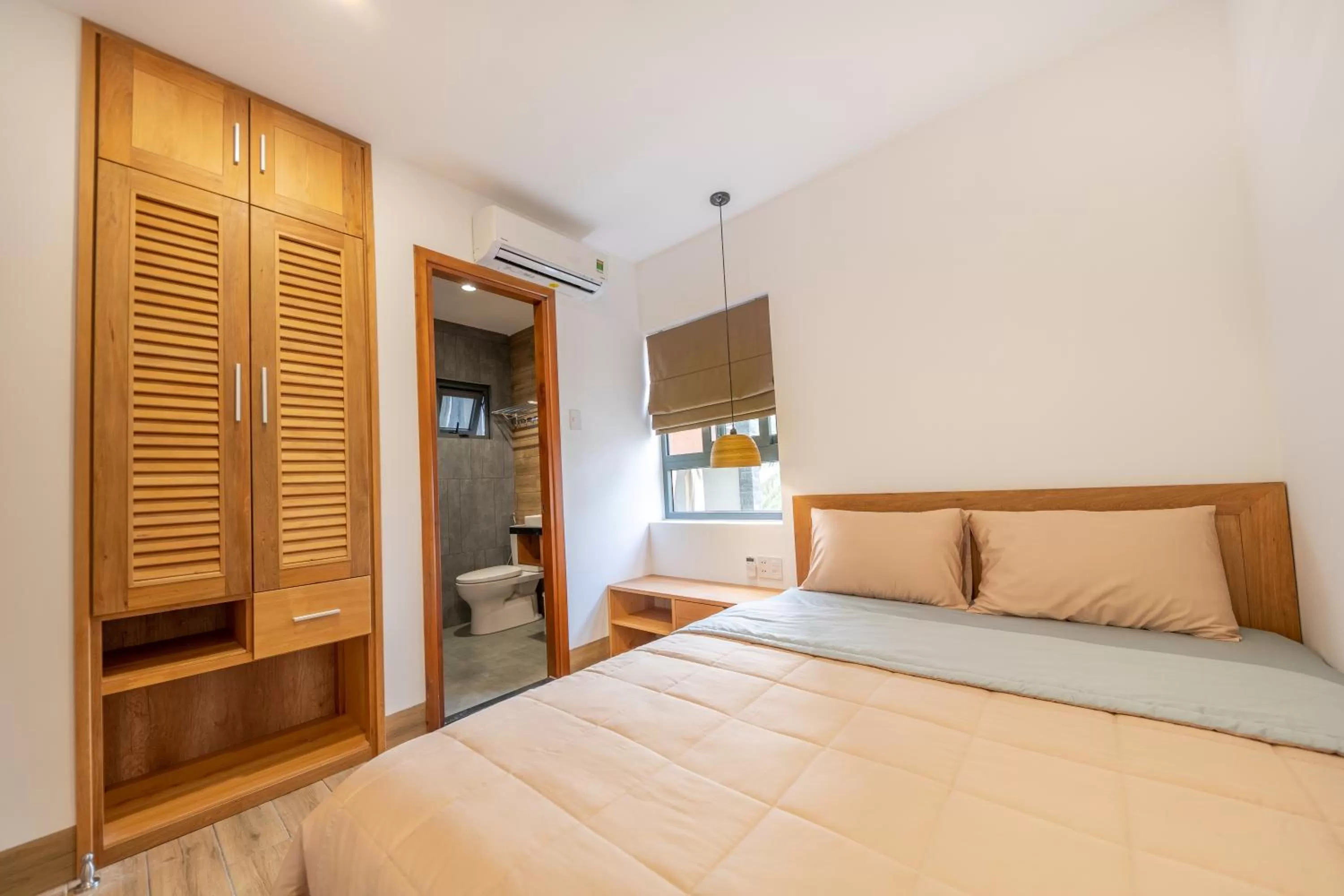 Bed in Coast House Boutique Hotel