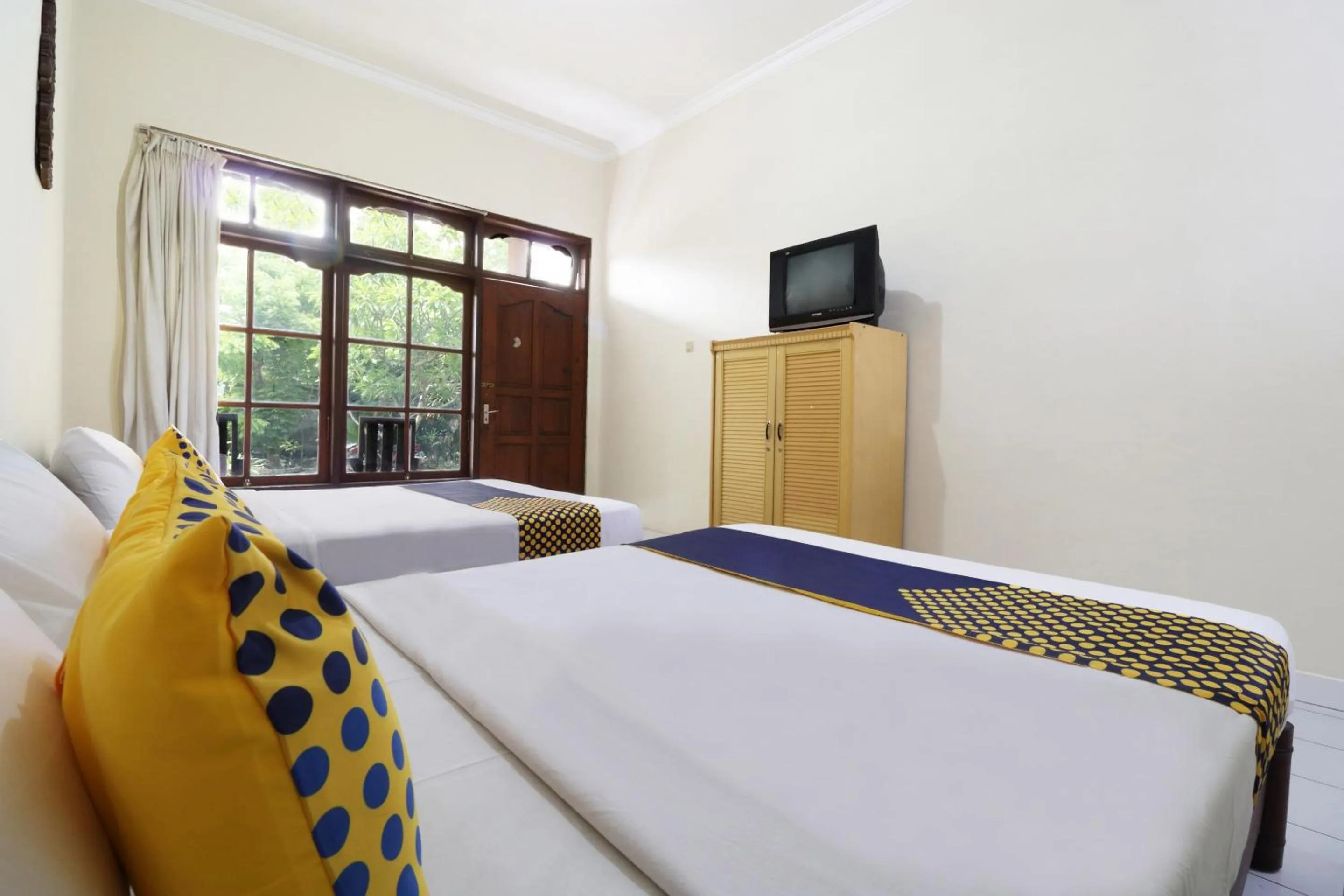 Bedroom in SPOT ON 2426 Hotel Aget Jaya Ii