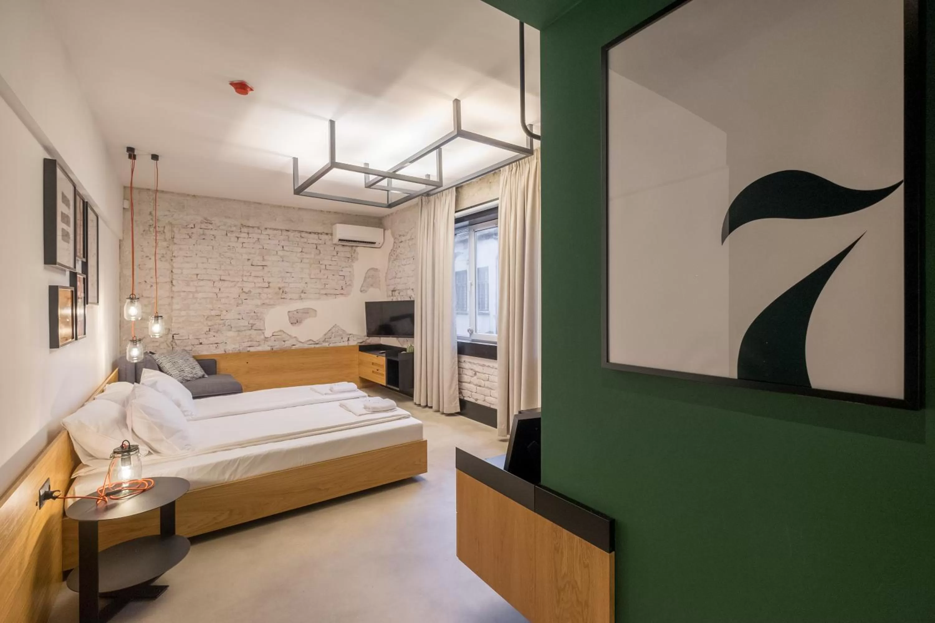 Bed in R34 Boutique Hotel