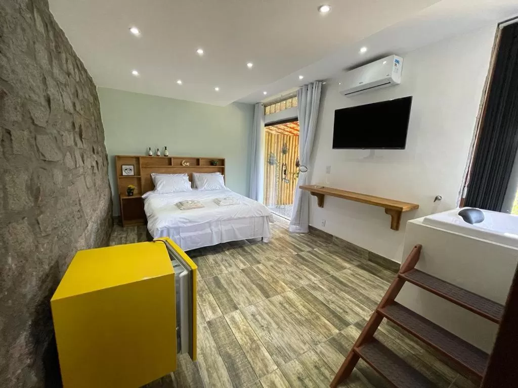 Bed in Pousada R.N.C. Nosso Paraíso