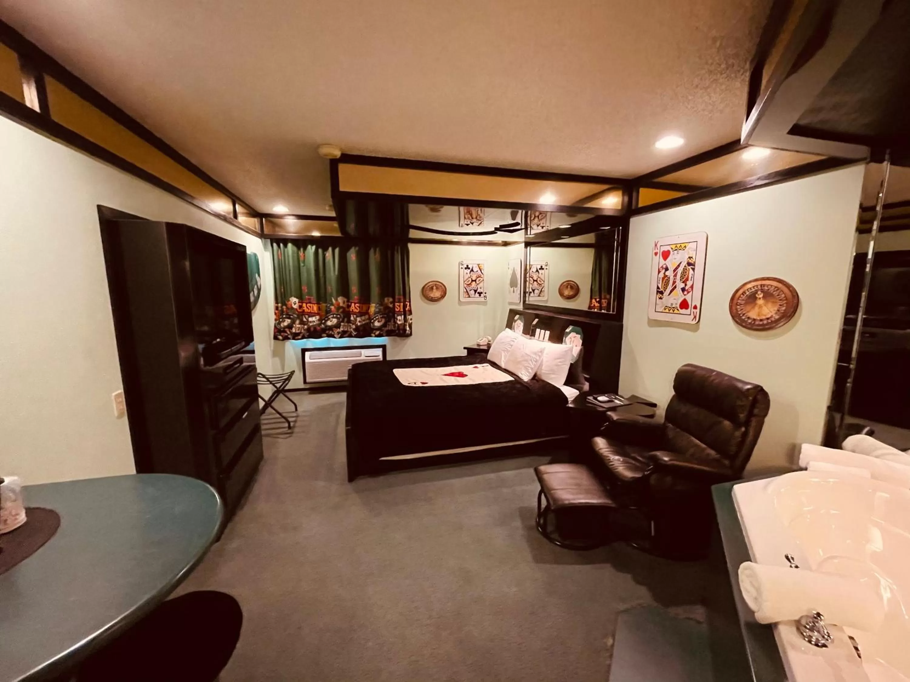 Bedroom, Bed in Designer Inn and Suites