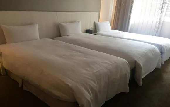 Bed in Forward Hotel Taipei Nangang