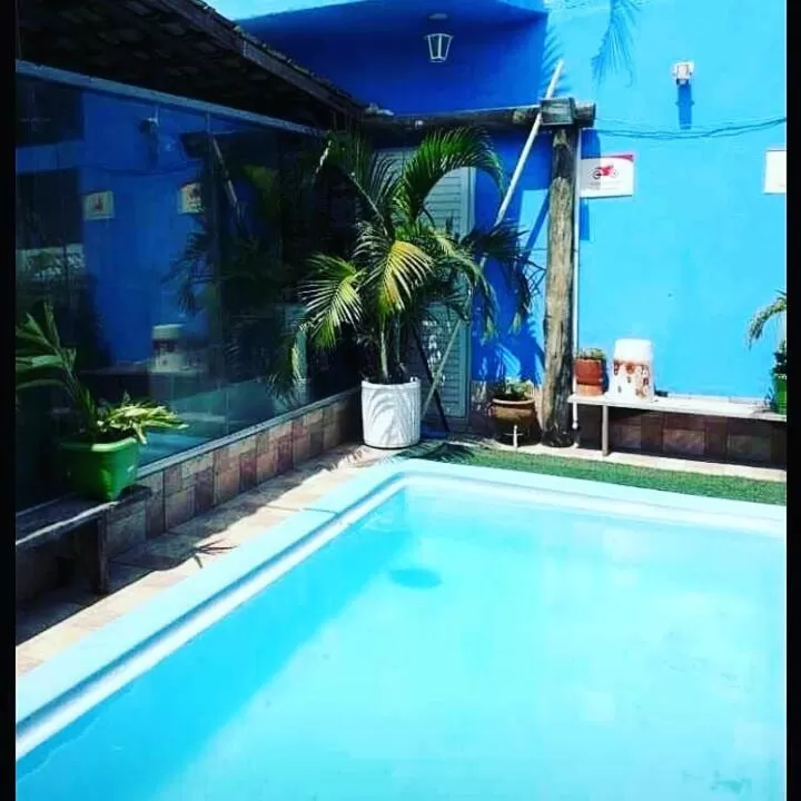 Swimming Pool in The House Pousada e Hospedagem Enseada- Guarujá