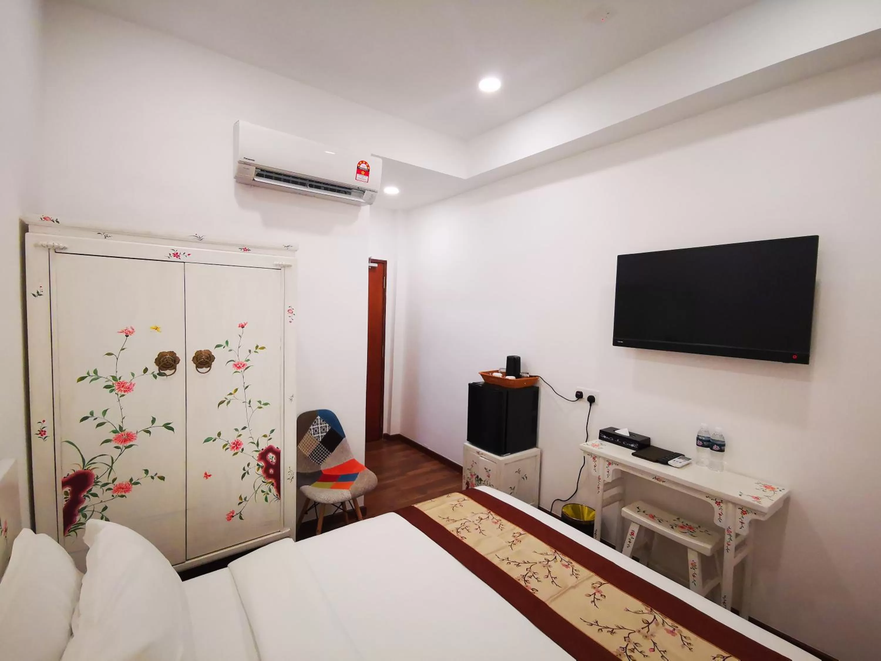 Bed in Mclane Boutique Hotel