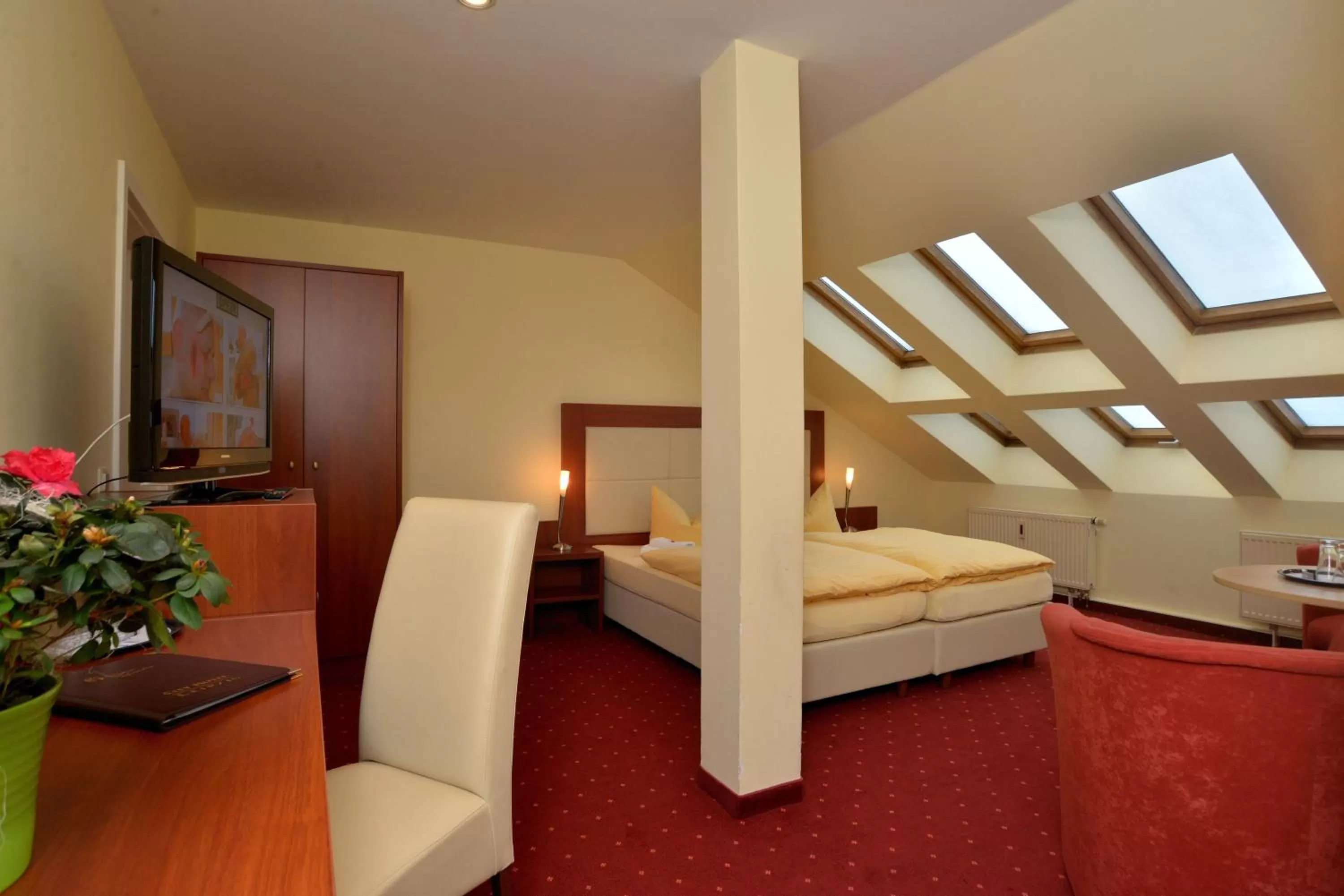 Seating area, Bed in Hotel via City Leipzig Mitte