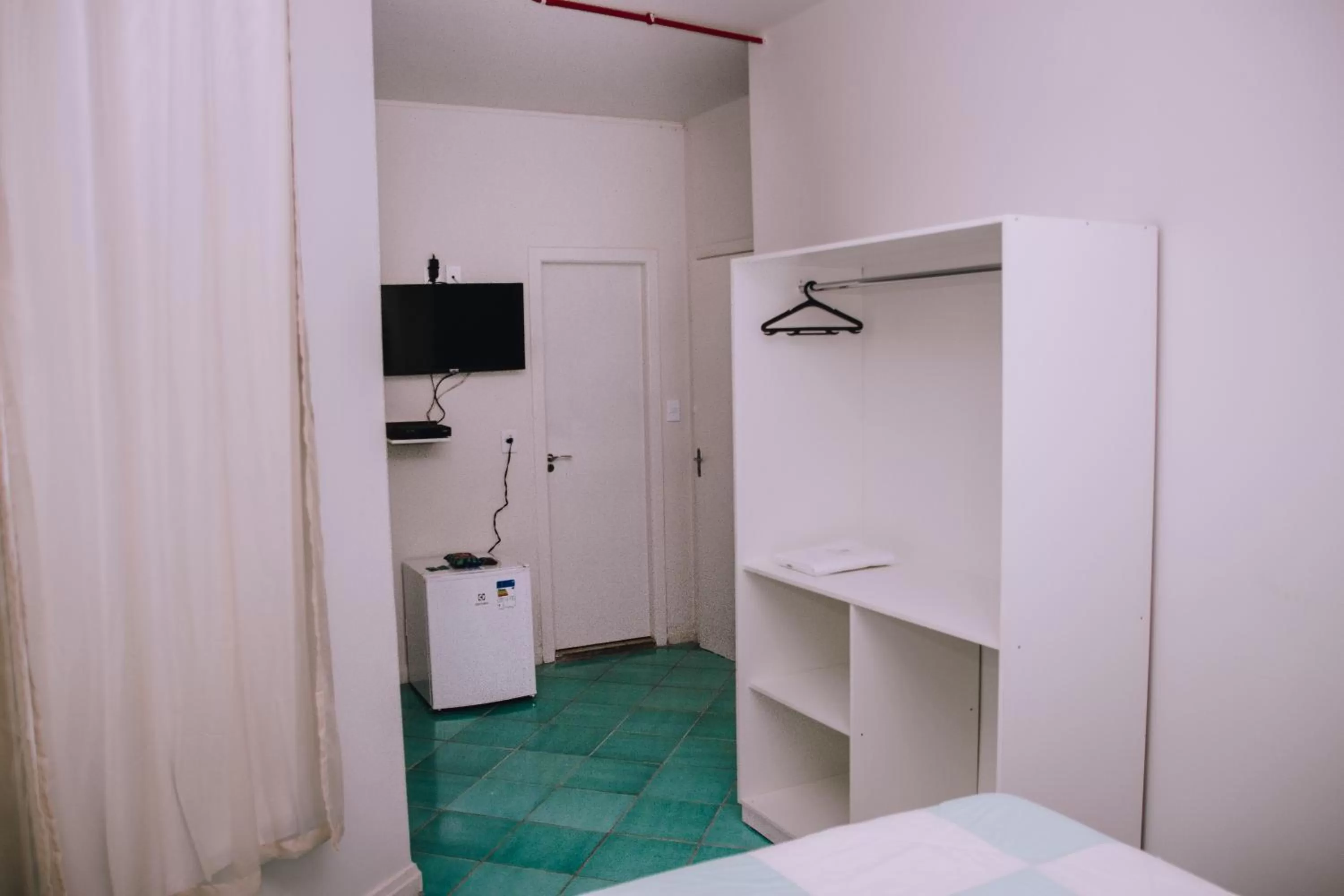 Bed in SAMIR HOTEL COMFORT