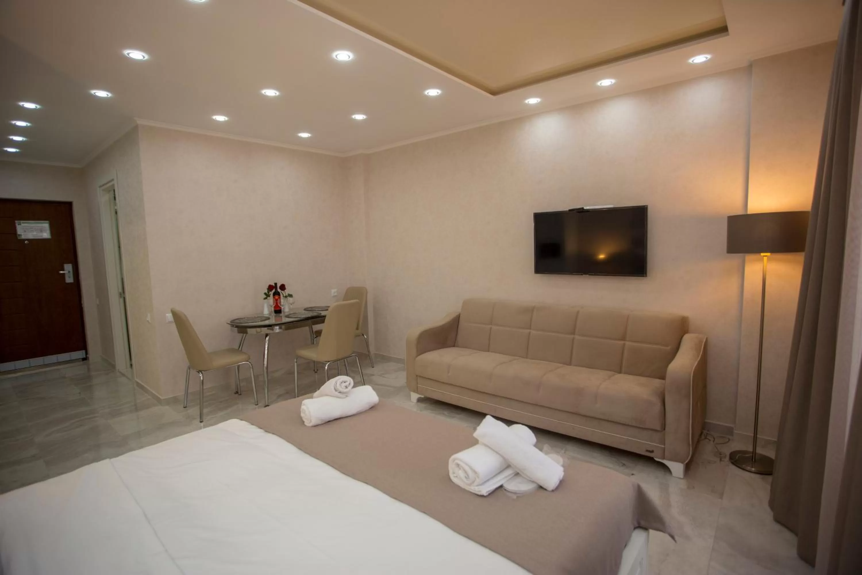 Seating area, Bed in Blue Star Batumi