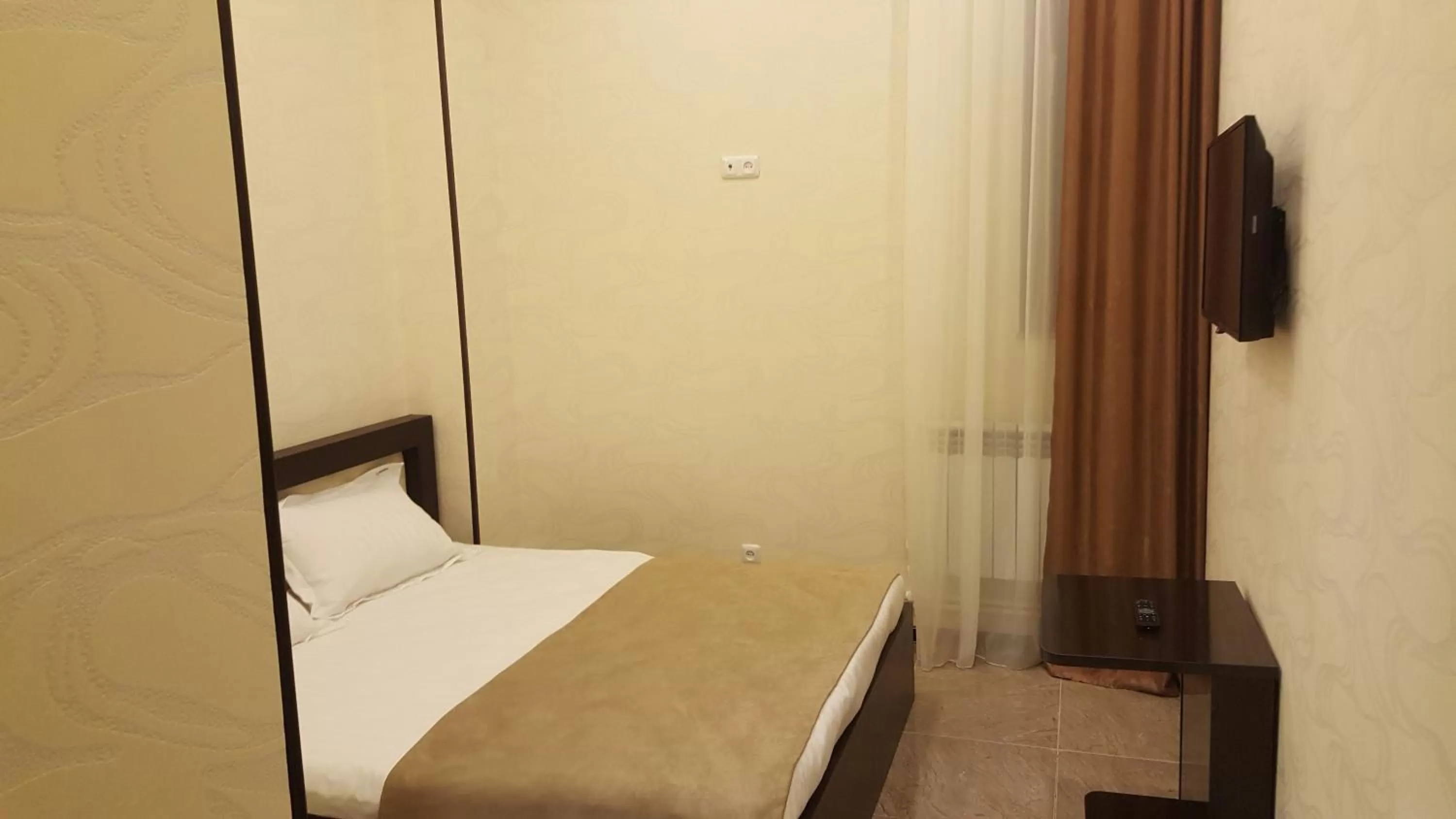 Bed in Eridana Hotel