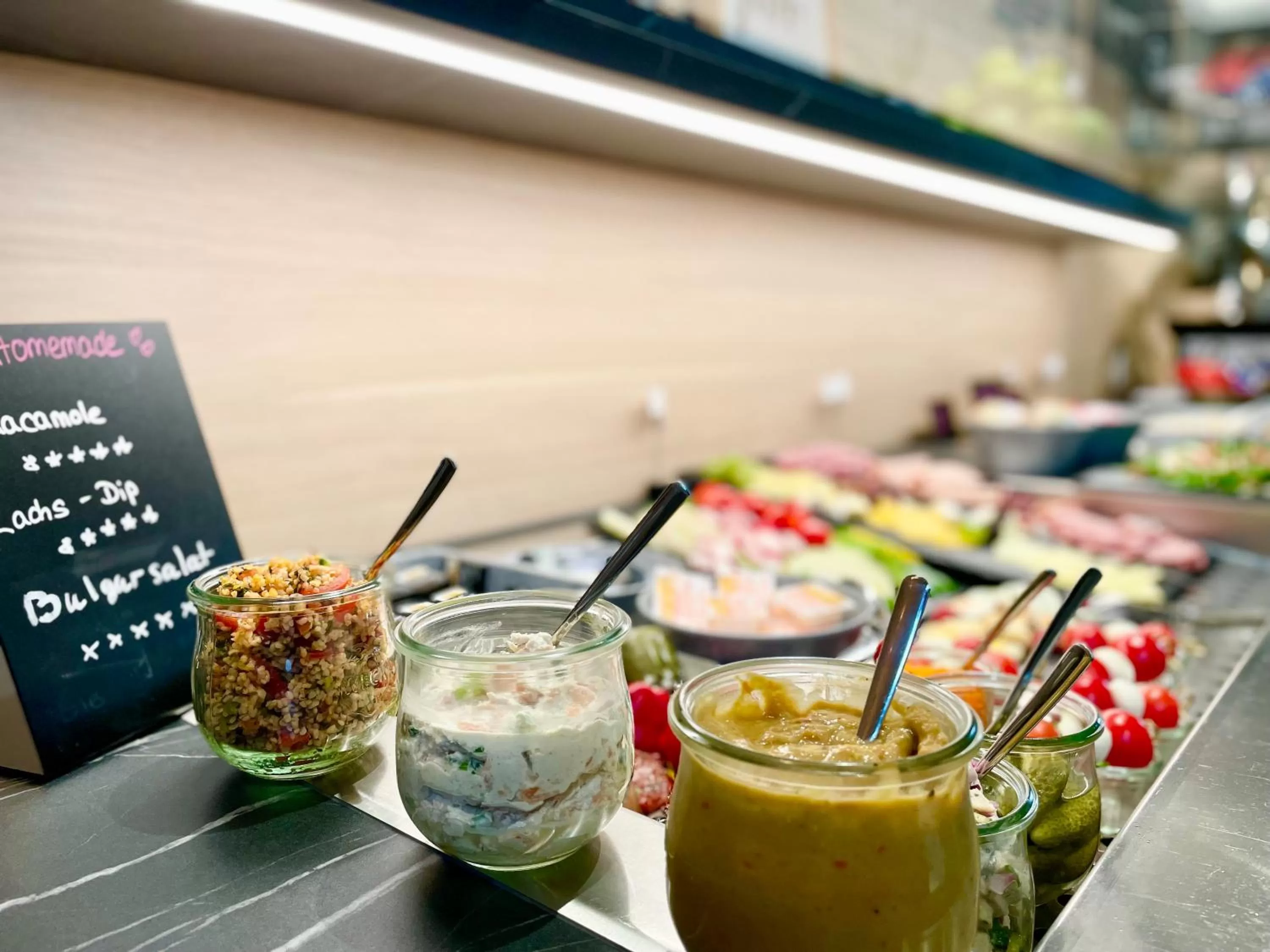 Buffet breakfast in zeitwohnhaus SUITE-HOTEL & SERVICED APARTMENTS