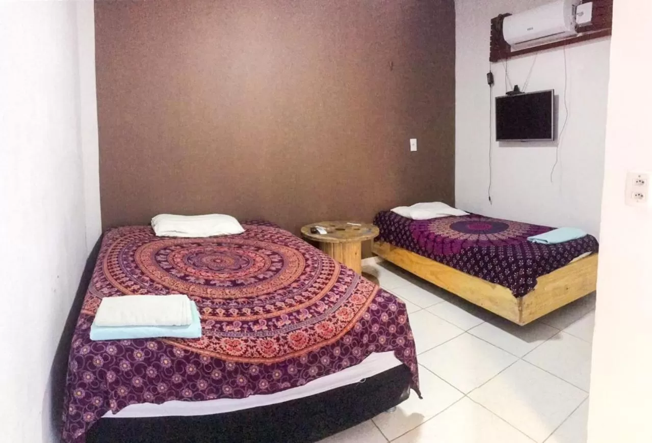 Bed in Pousada Casa de Vó