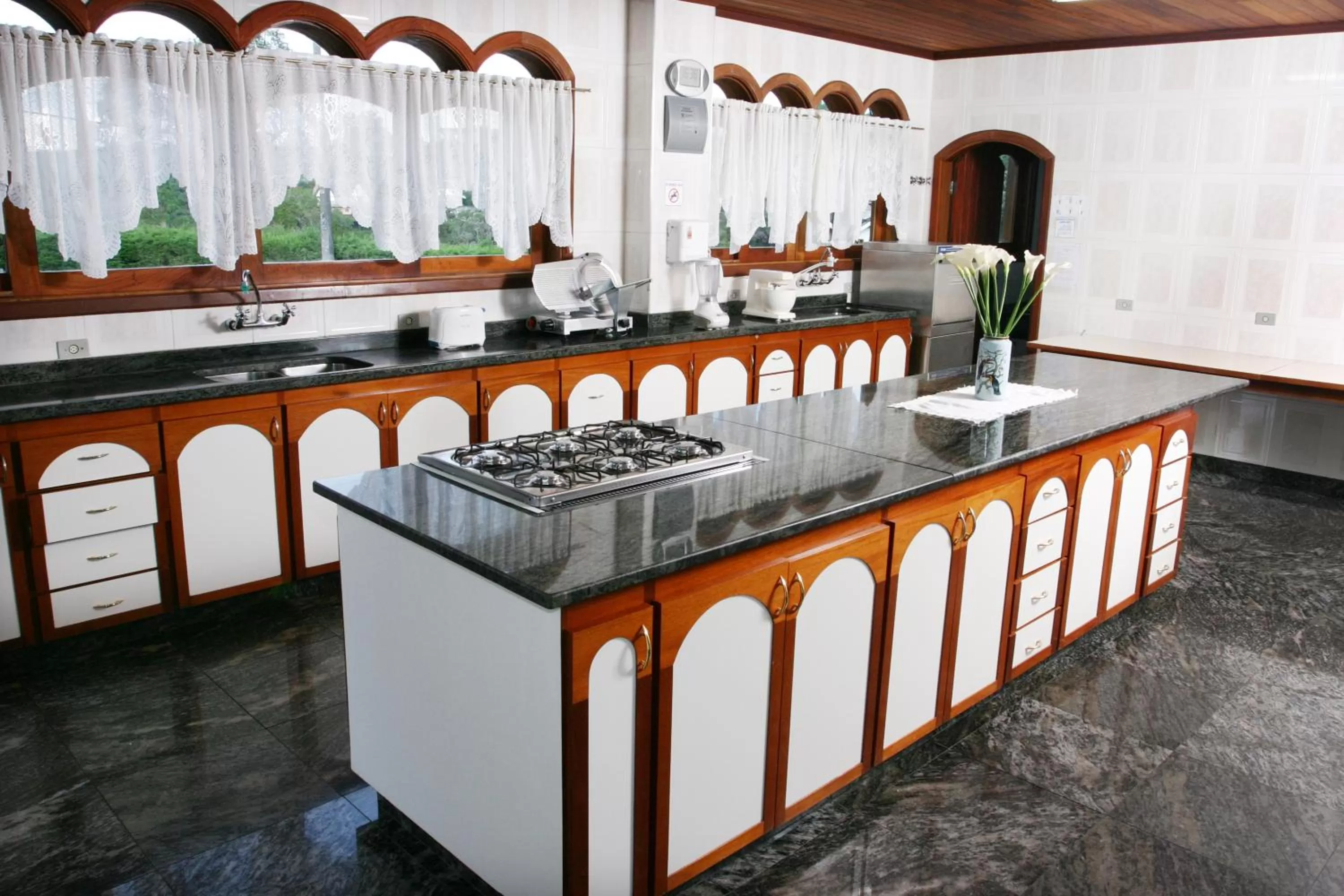 Kitchen or kitchenette in Pousada Recanto Almeida