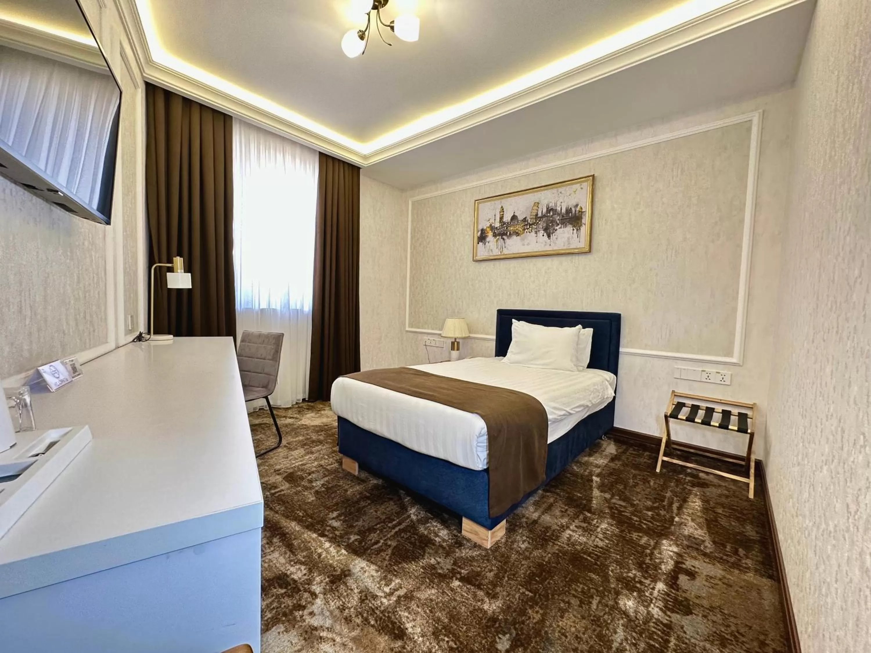 Bed in Garnet Hotel Tashkent
