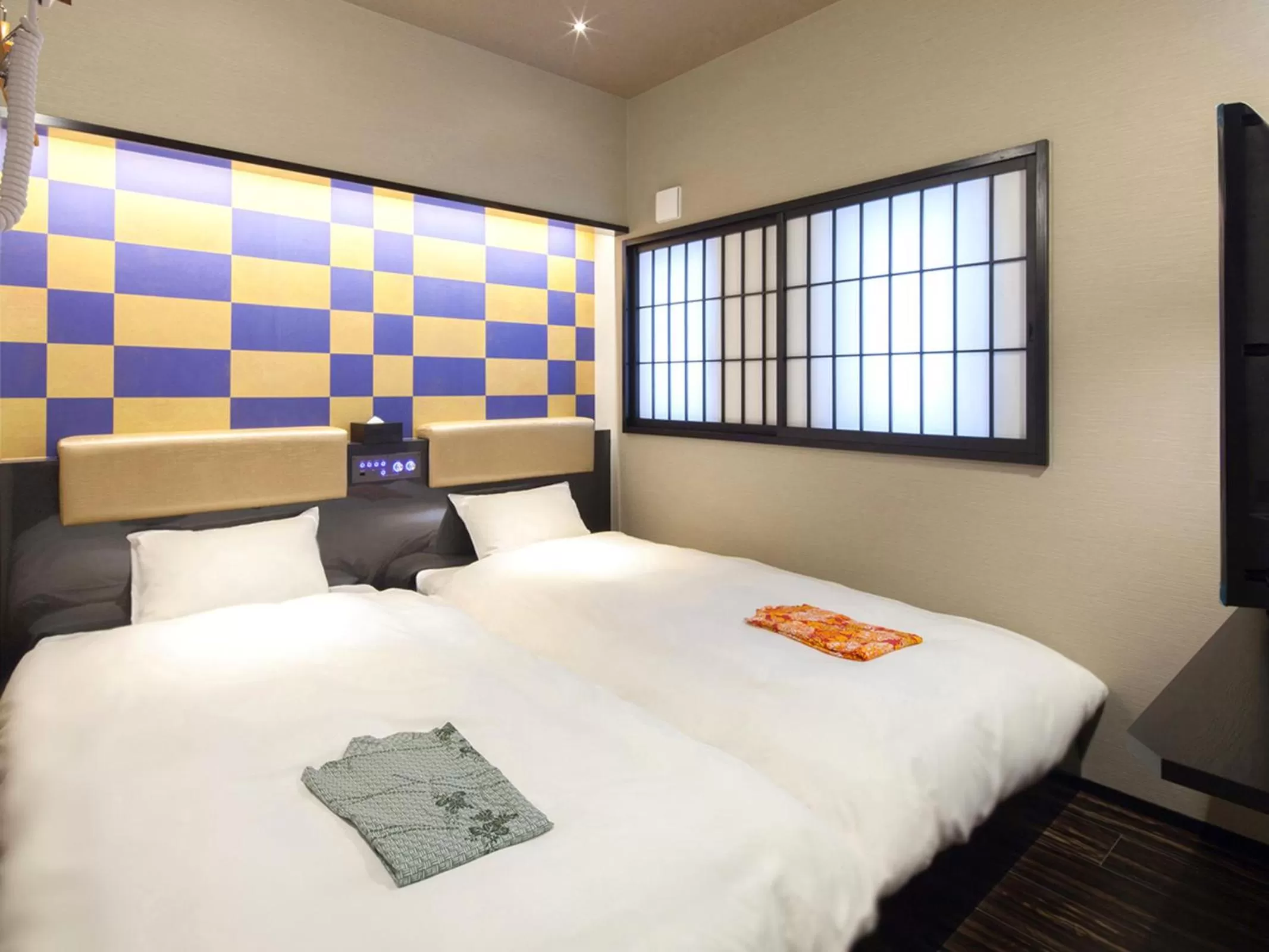 Bed in cotoha Hotel Okachimachi