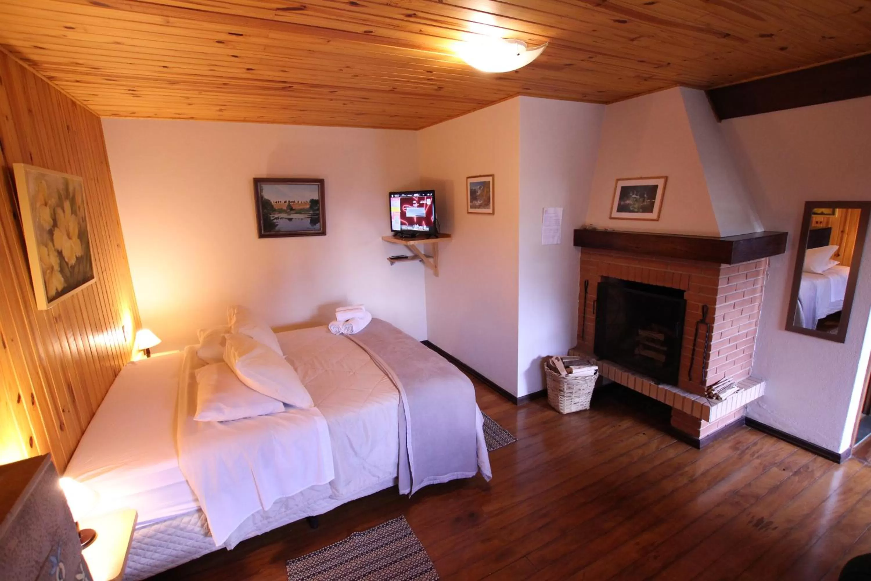 Bed in Pousada Aguia da Montanha