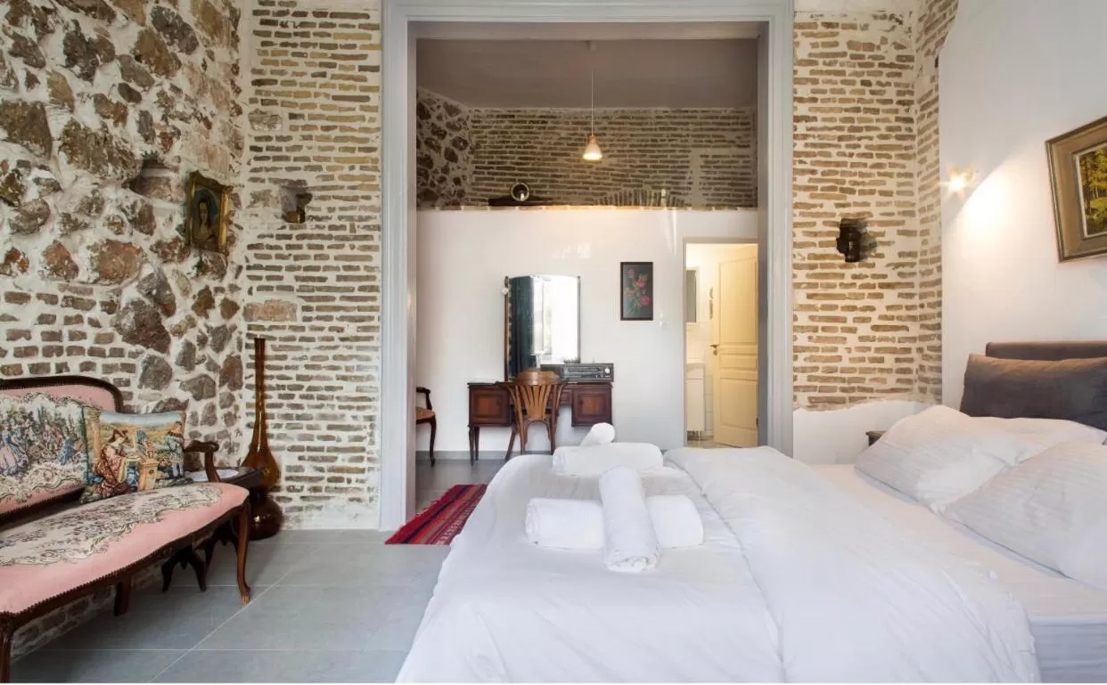 Bed in A litte Taste of Home Guest House