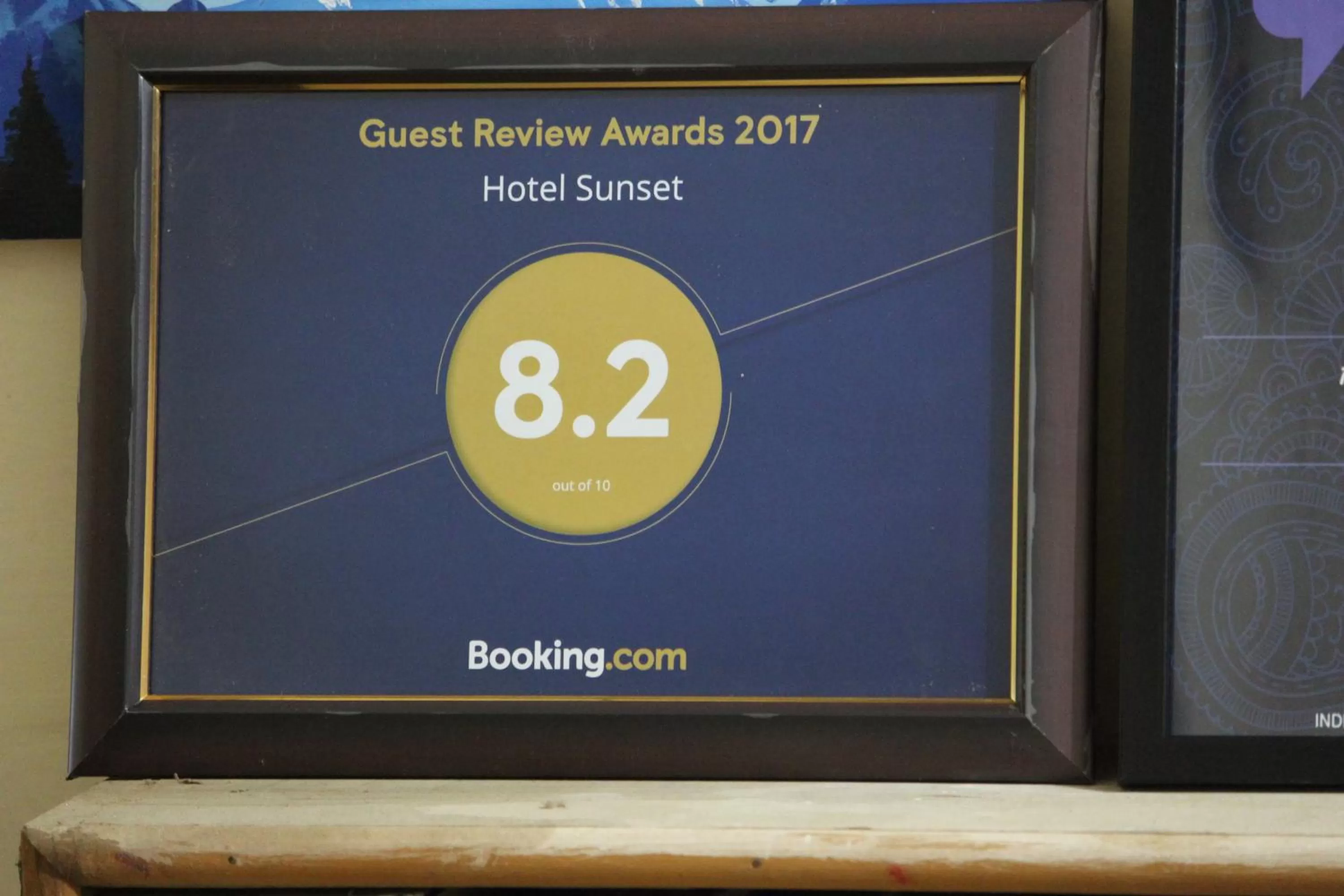 Property logo or sign in Hotel Sunset