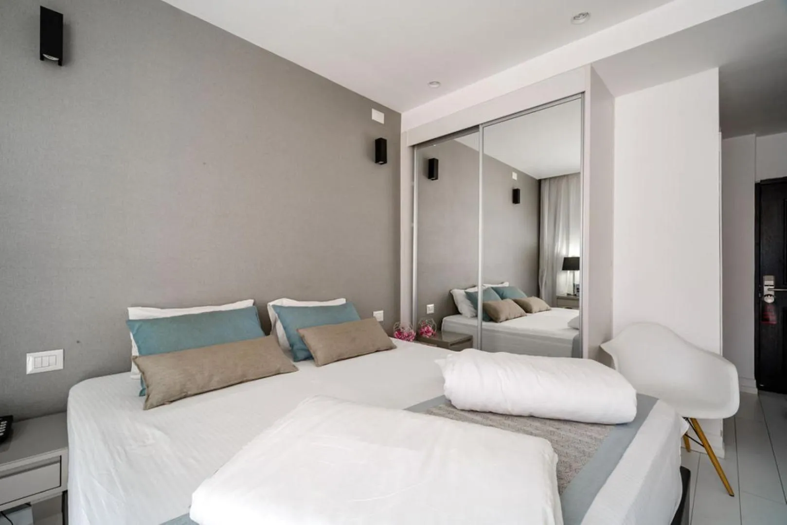 Bed in Kikar Boutique Hotel