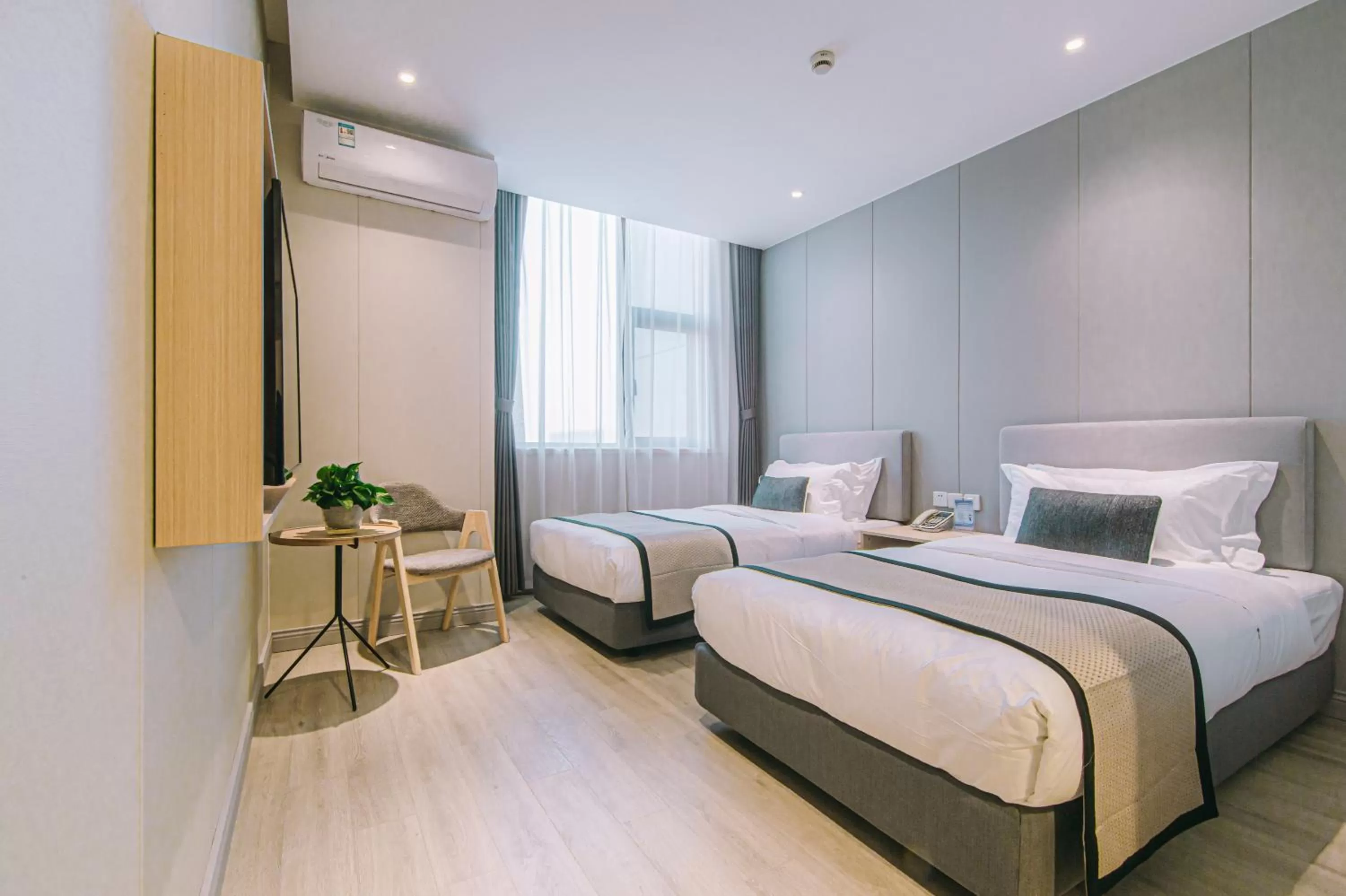 Bed in Shanghai JOYFUL YARD Hotel-Free shuttle bus to Pudong Airport and Disneyland
