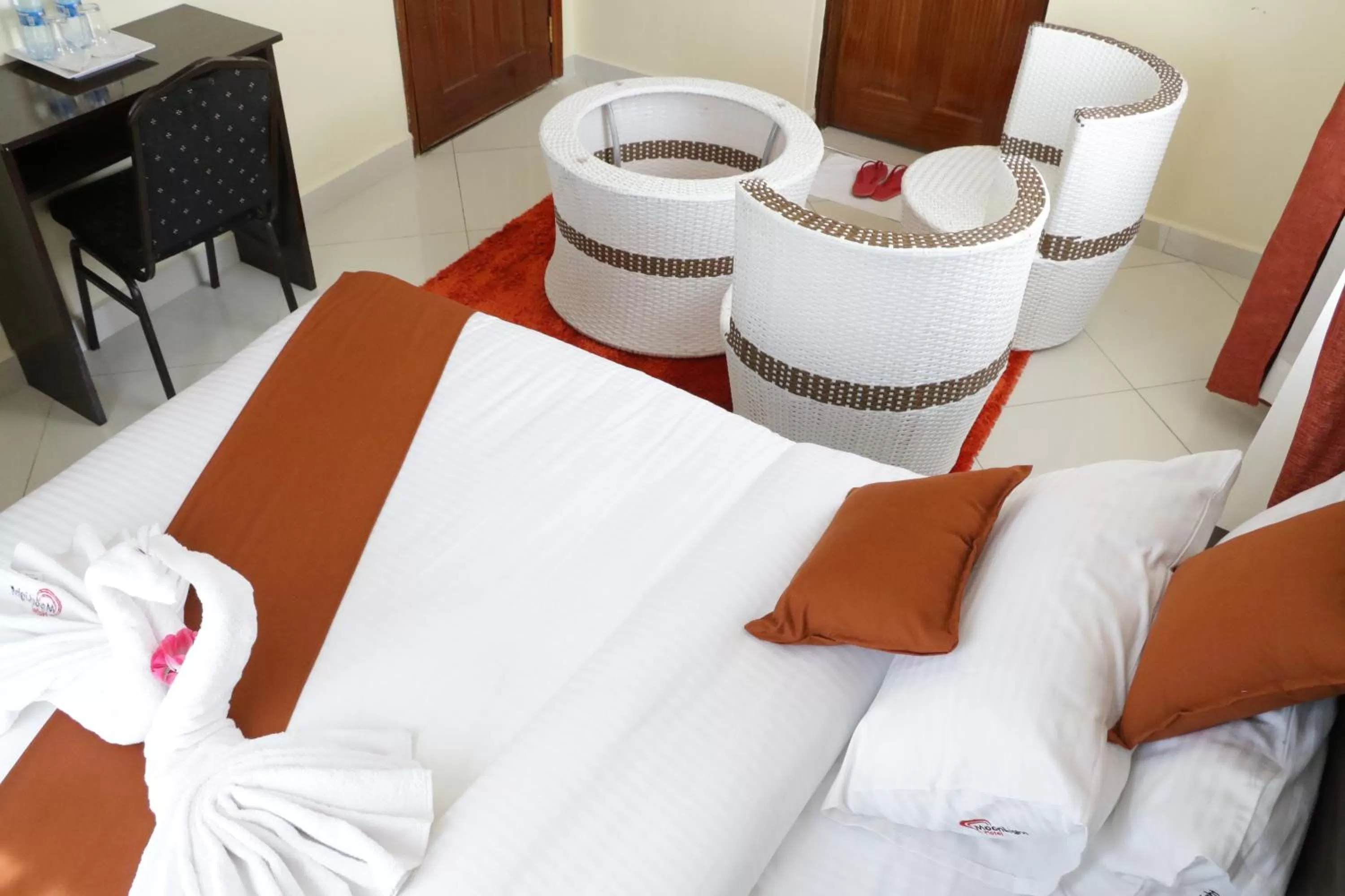 Bed in Claire de Lune Moonlight Hotel