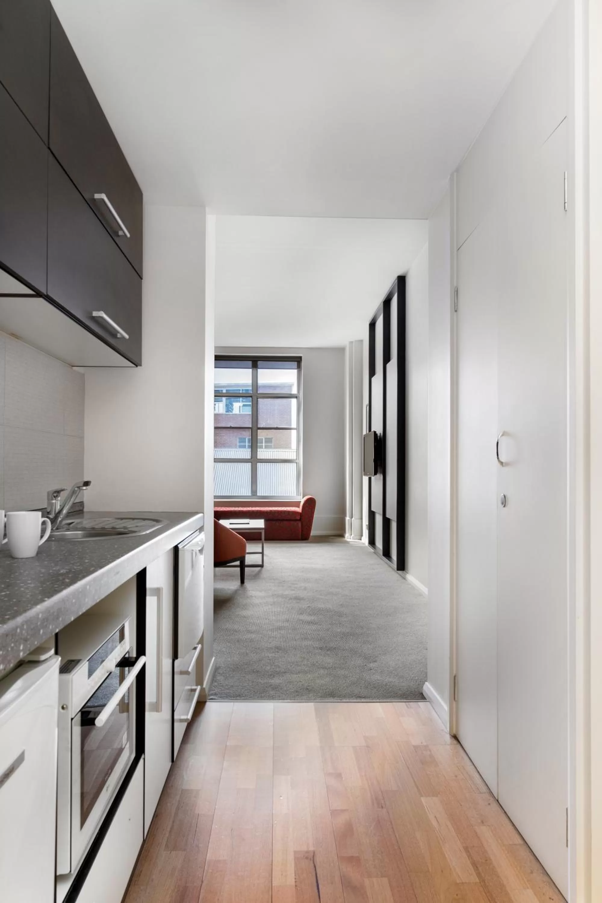 Kitchen or kitchenette in Mantra One Sandy Bay Road