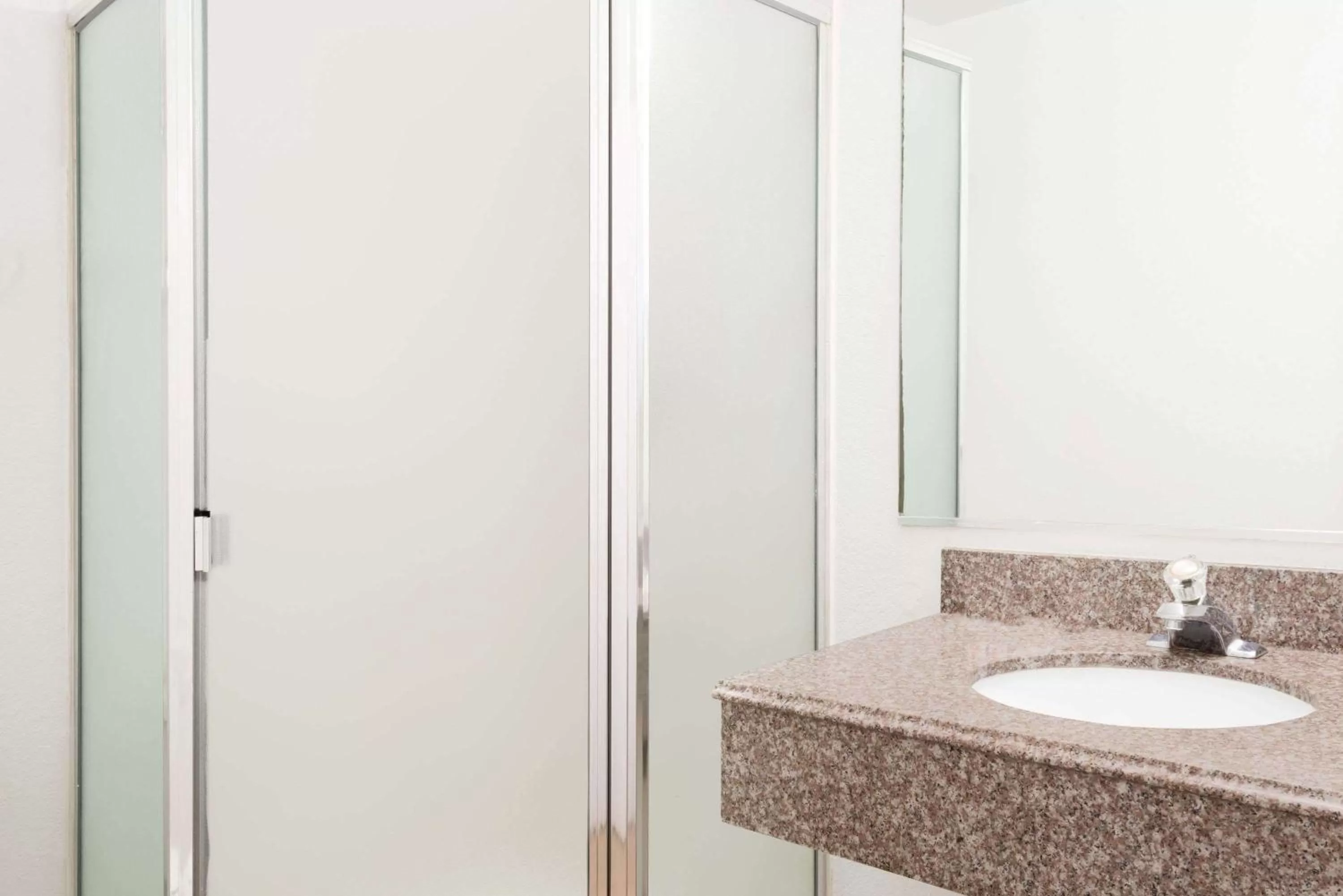 Bathroom in Super 8 by Wyndham Midwest City OK