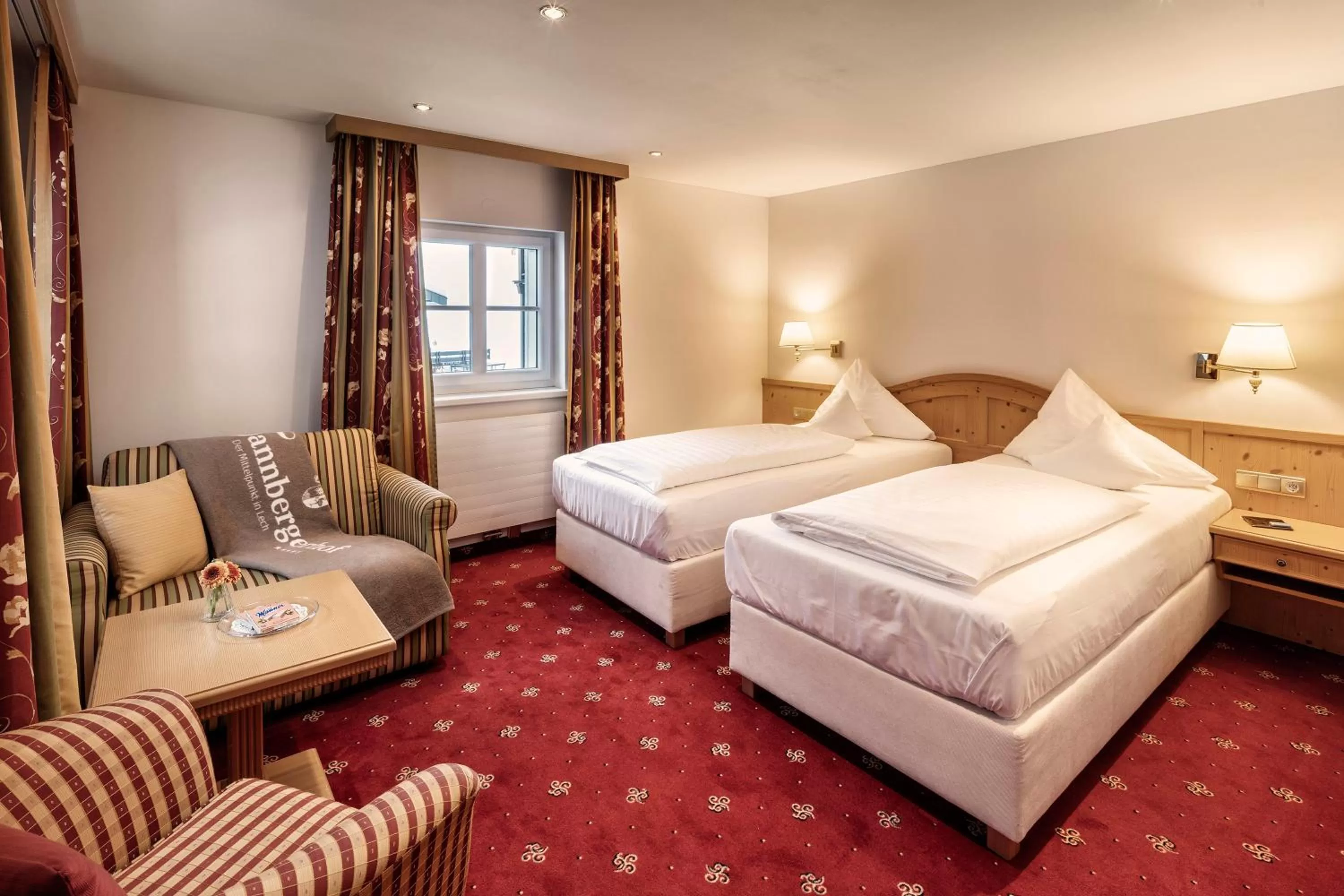 Photo of the whole room, Bed in Hotel Tannbergerhof im Zentrum von Lech