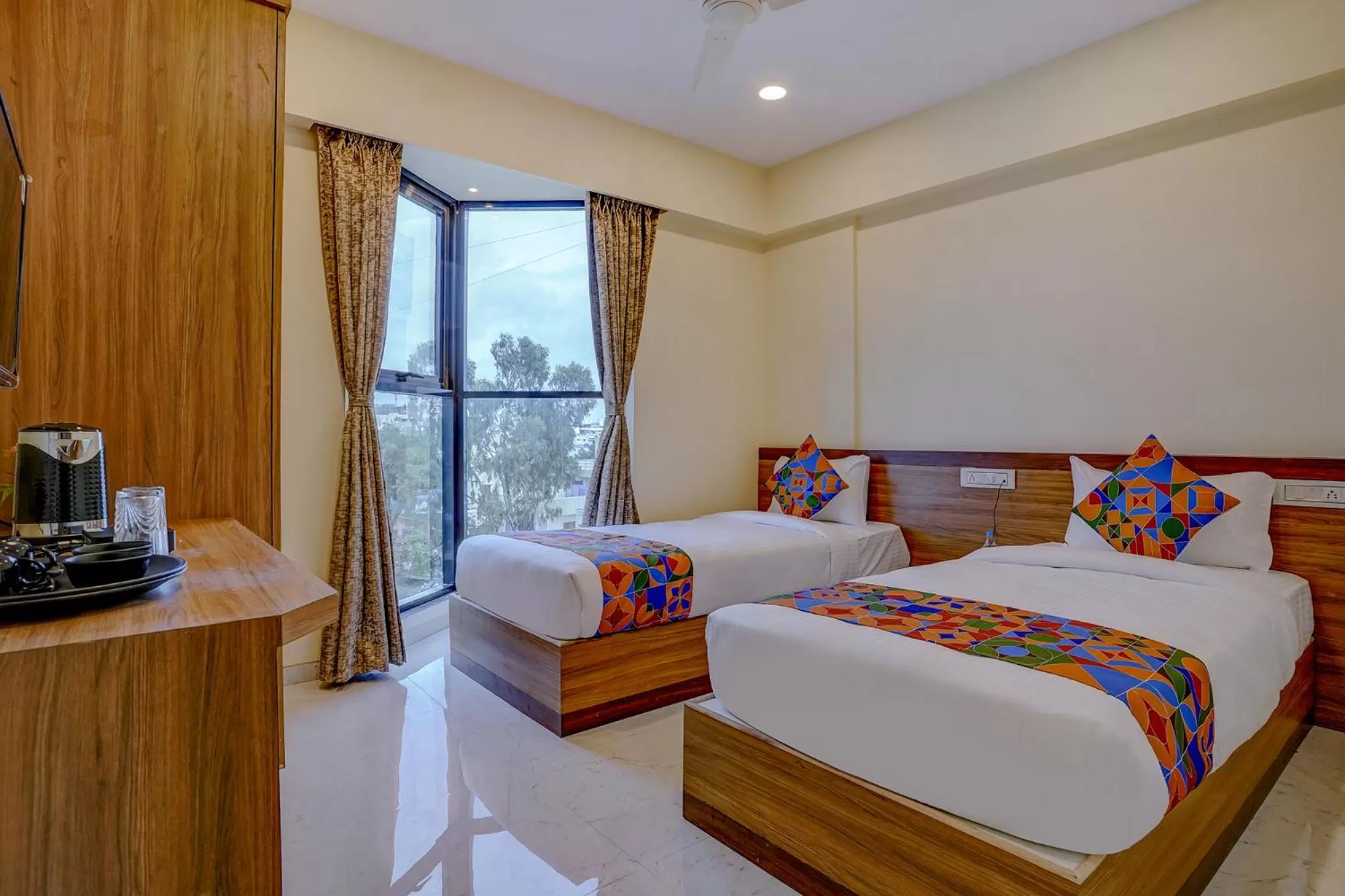 Photo of the whole room in FabHotel Crystal Homes - nr Rajaram Bhiku stadium