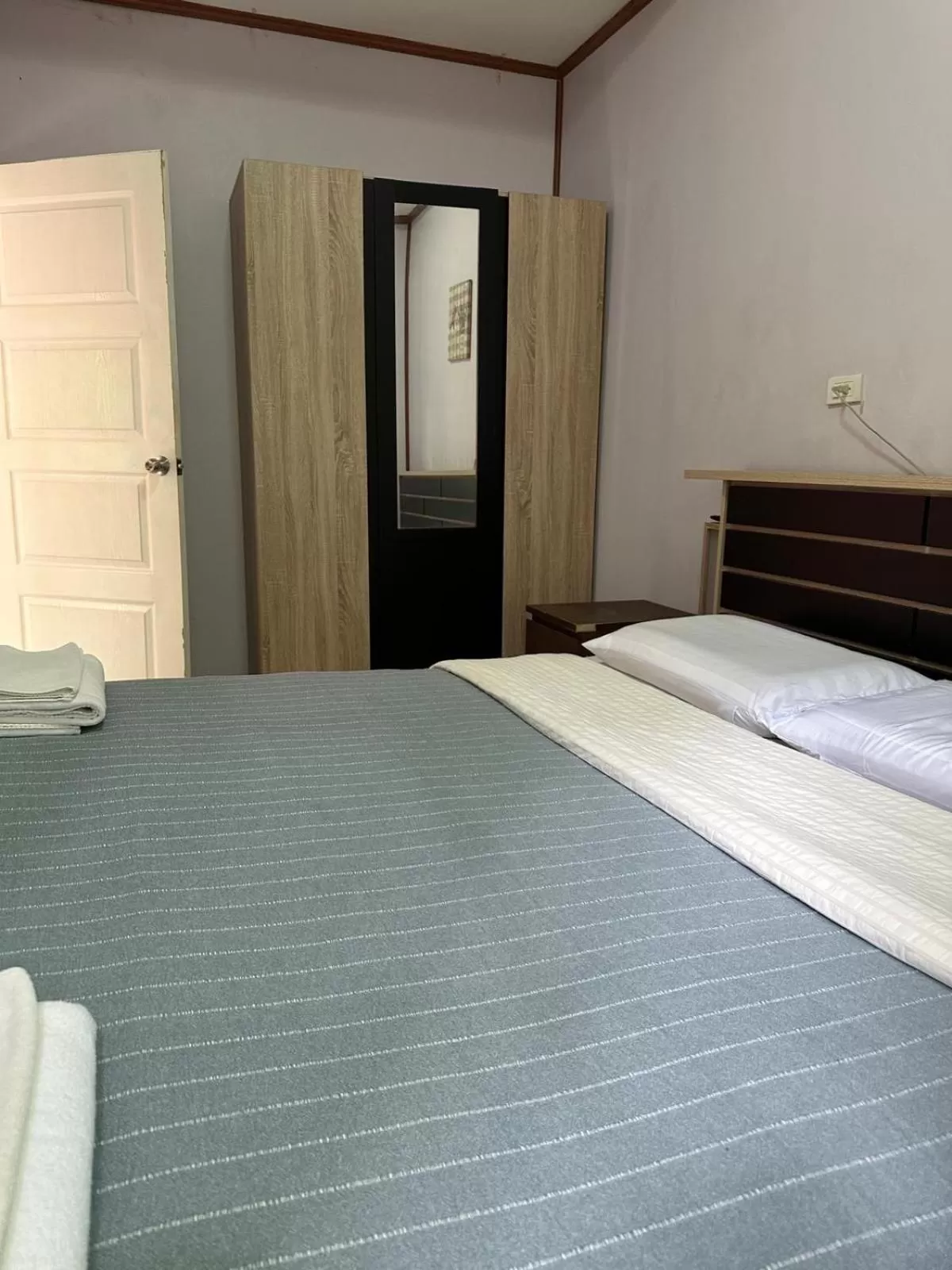 Photo of the whole room, Bed in Fine Times Resort