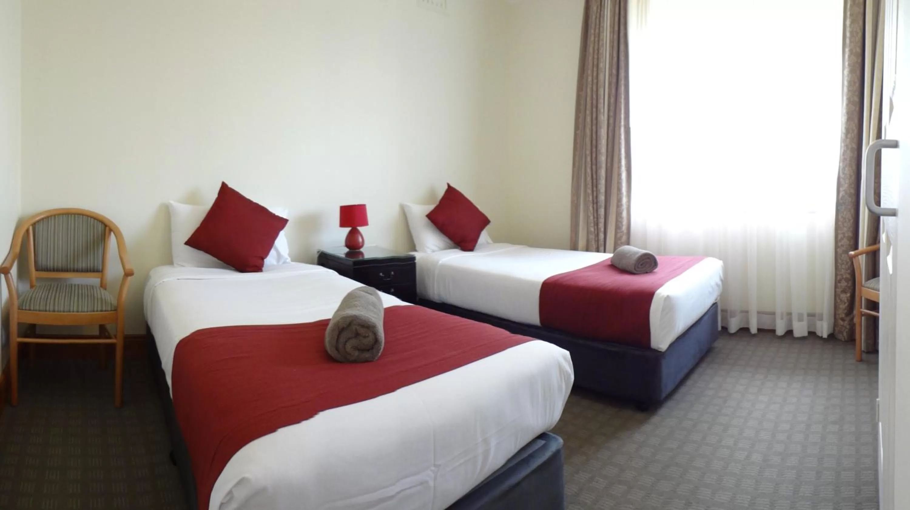 Bed in Three Explorers Motel