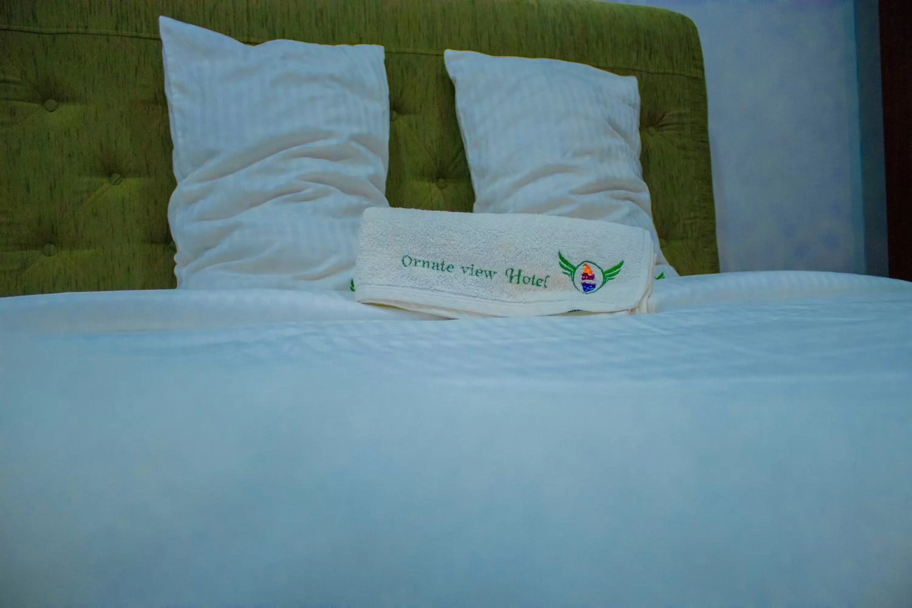 Bed in Ornateview Hotel