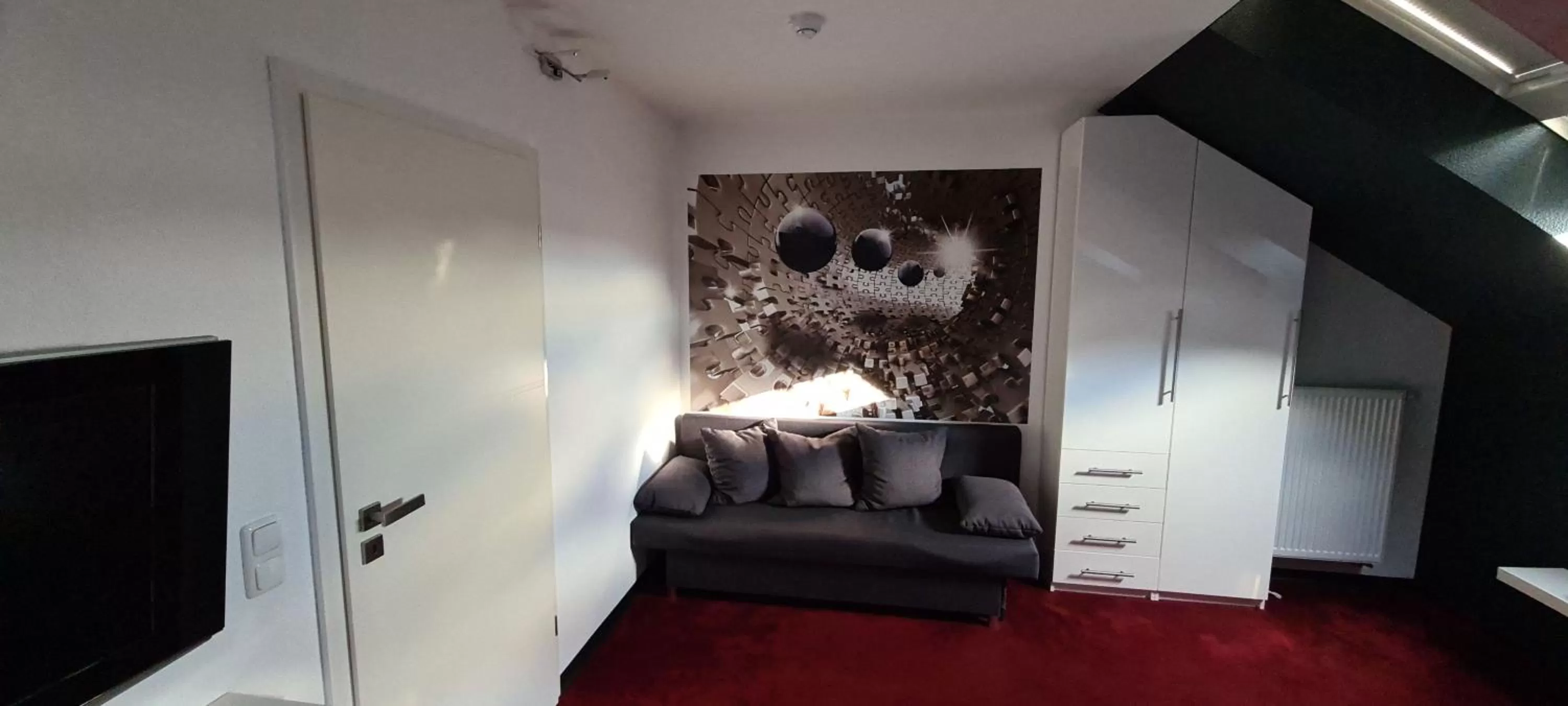 Communal lounge/ TV room in Hotel Come In