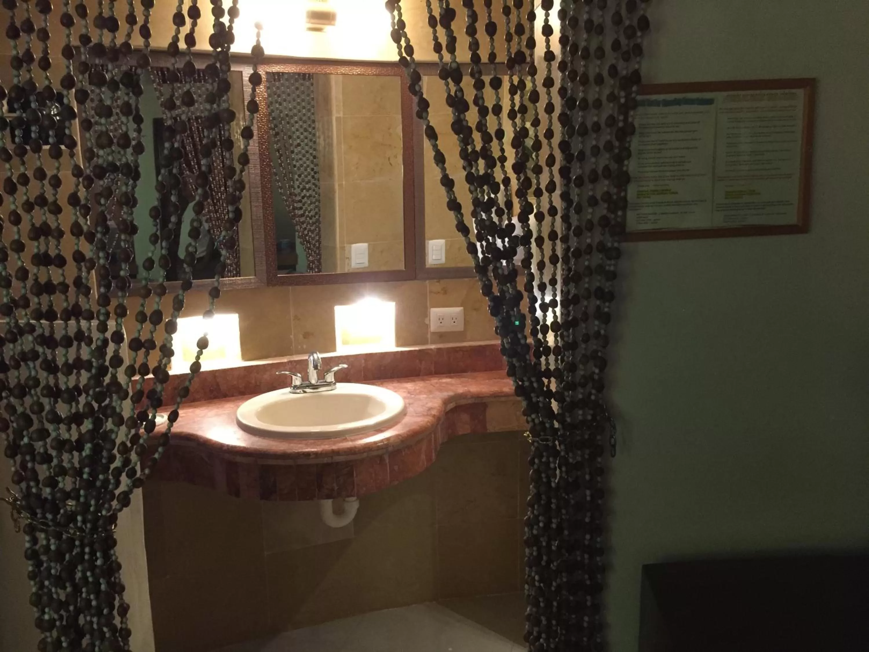 Bathroom in Cocos Cabañas Playa del Carmen Adults Only