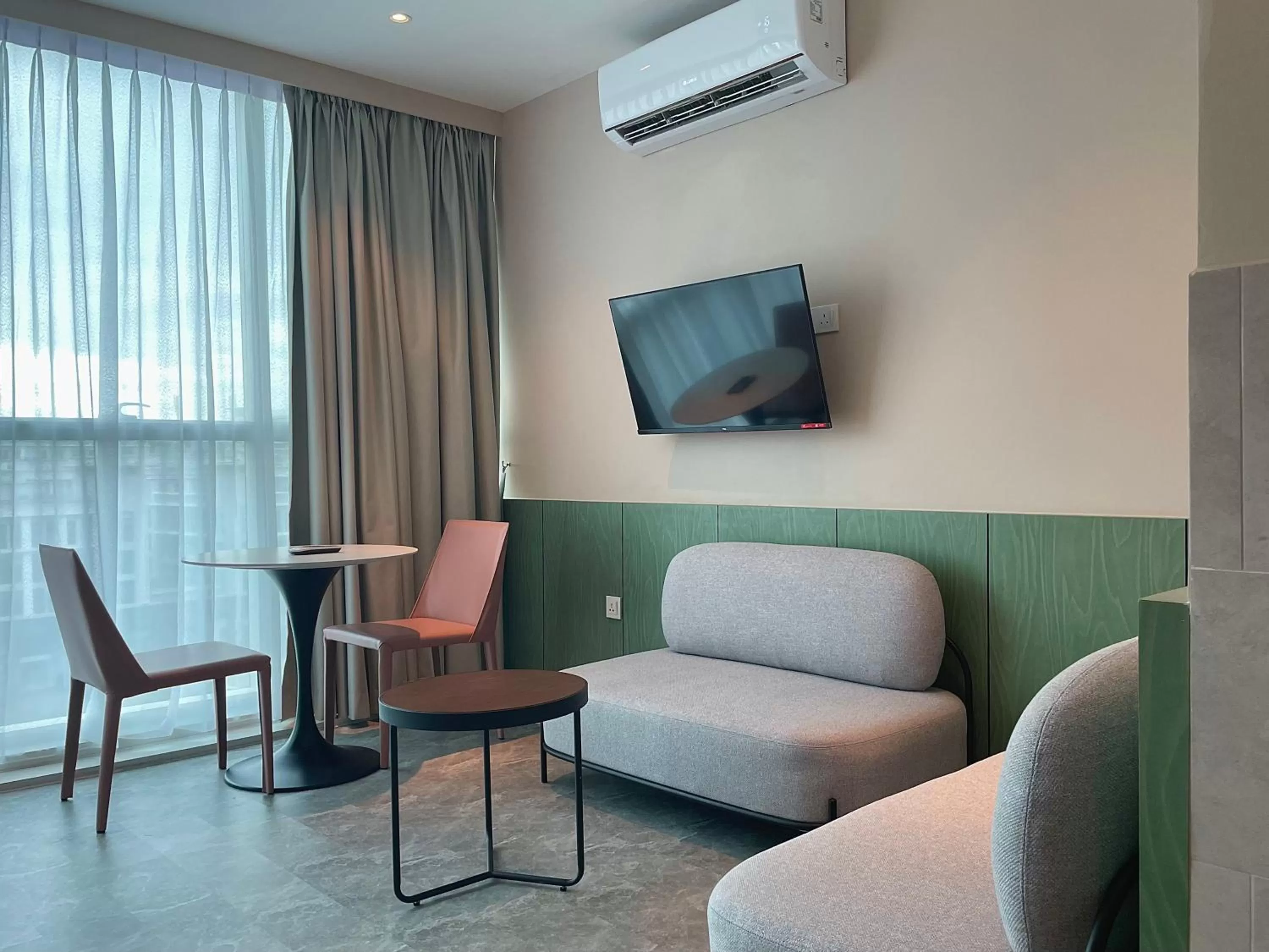 Living room in Harper Boutique Hotel at Sutera Avenue