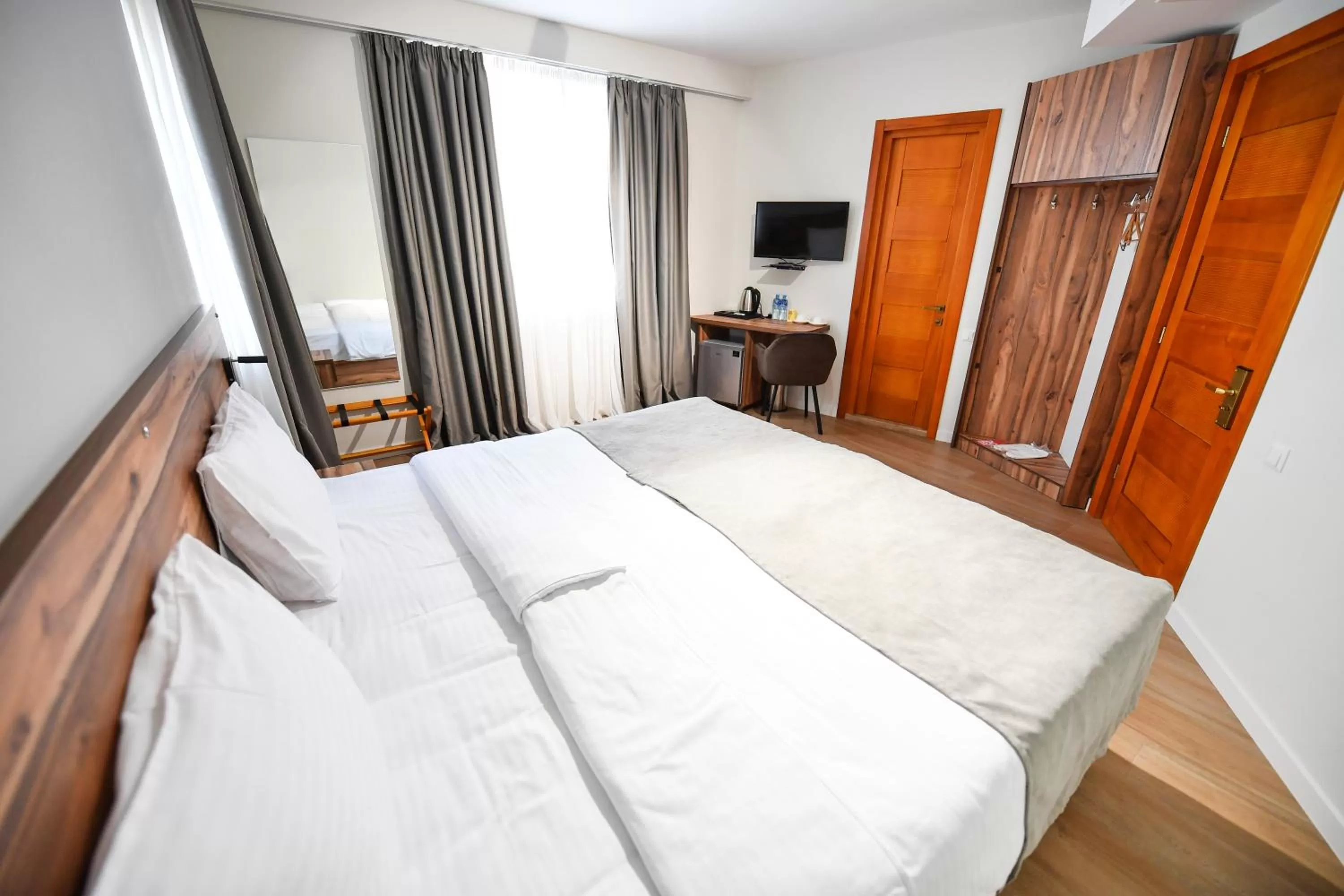 Communal lounge/ TV room, Bed in Address Boutique Hotel