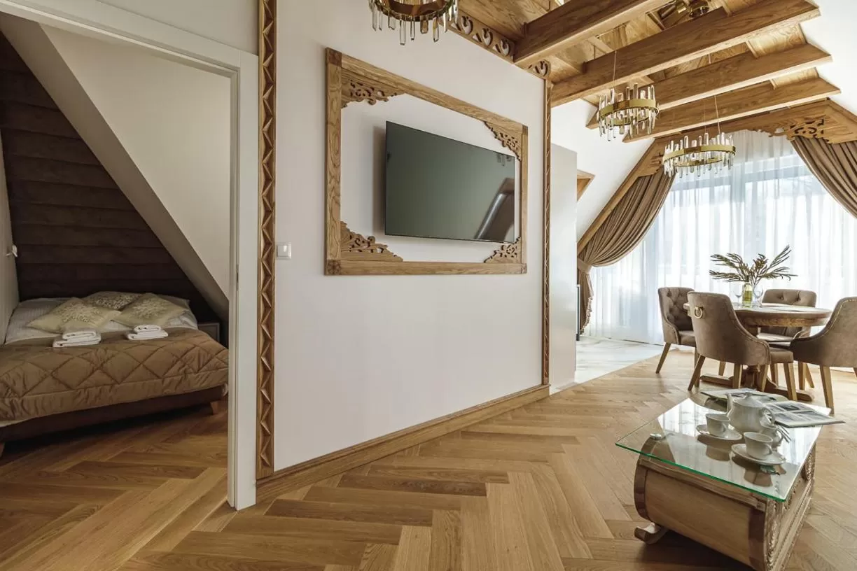 Bed, TV/Entertainment Center in Jagiellońska Residence