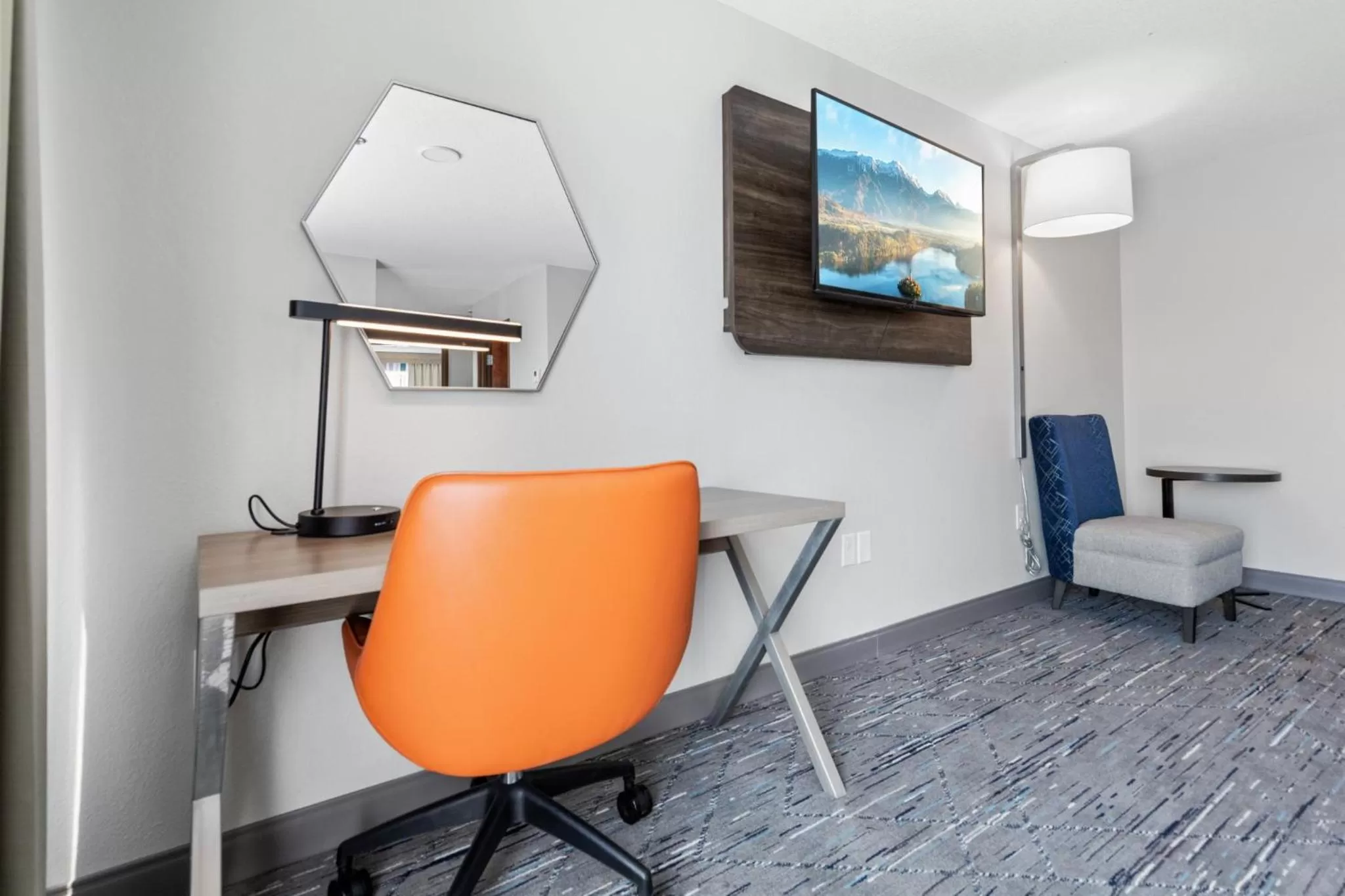 Photo of the whole room, TV/Entertainment Center in Holiday Inn Express Hotel & Suites Starkville, an IHG Hotel