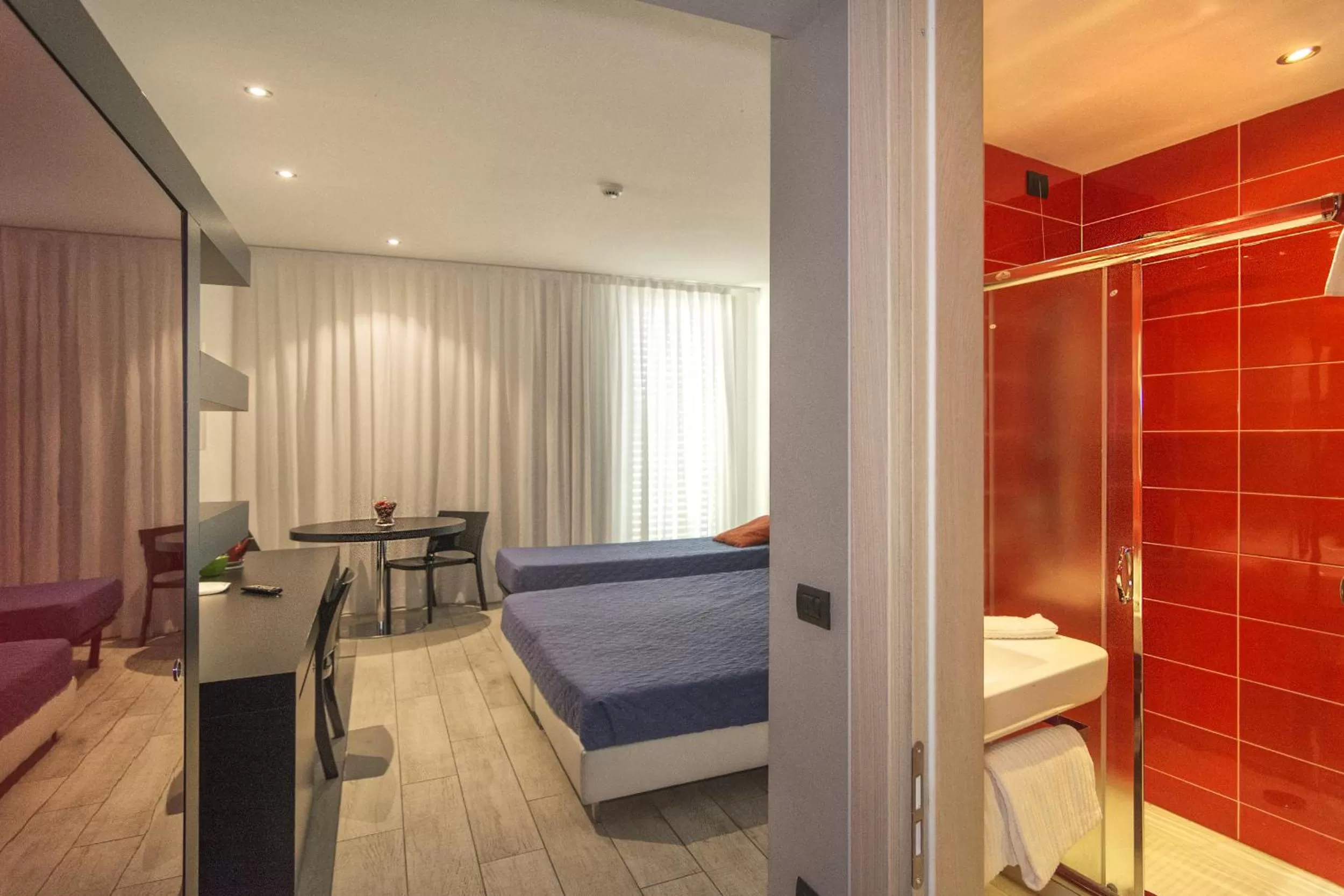 Bed in Blue Shades Hotel