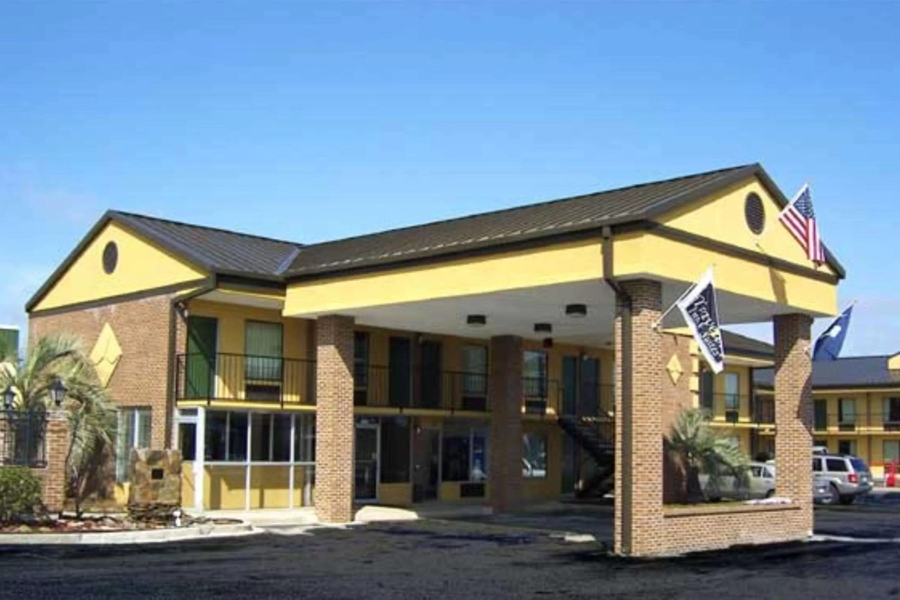 Property building in Travelers Inn & Suites