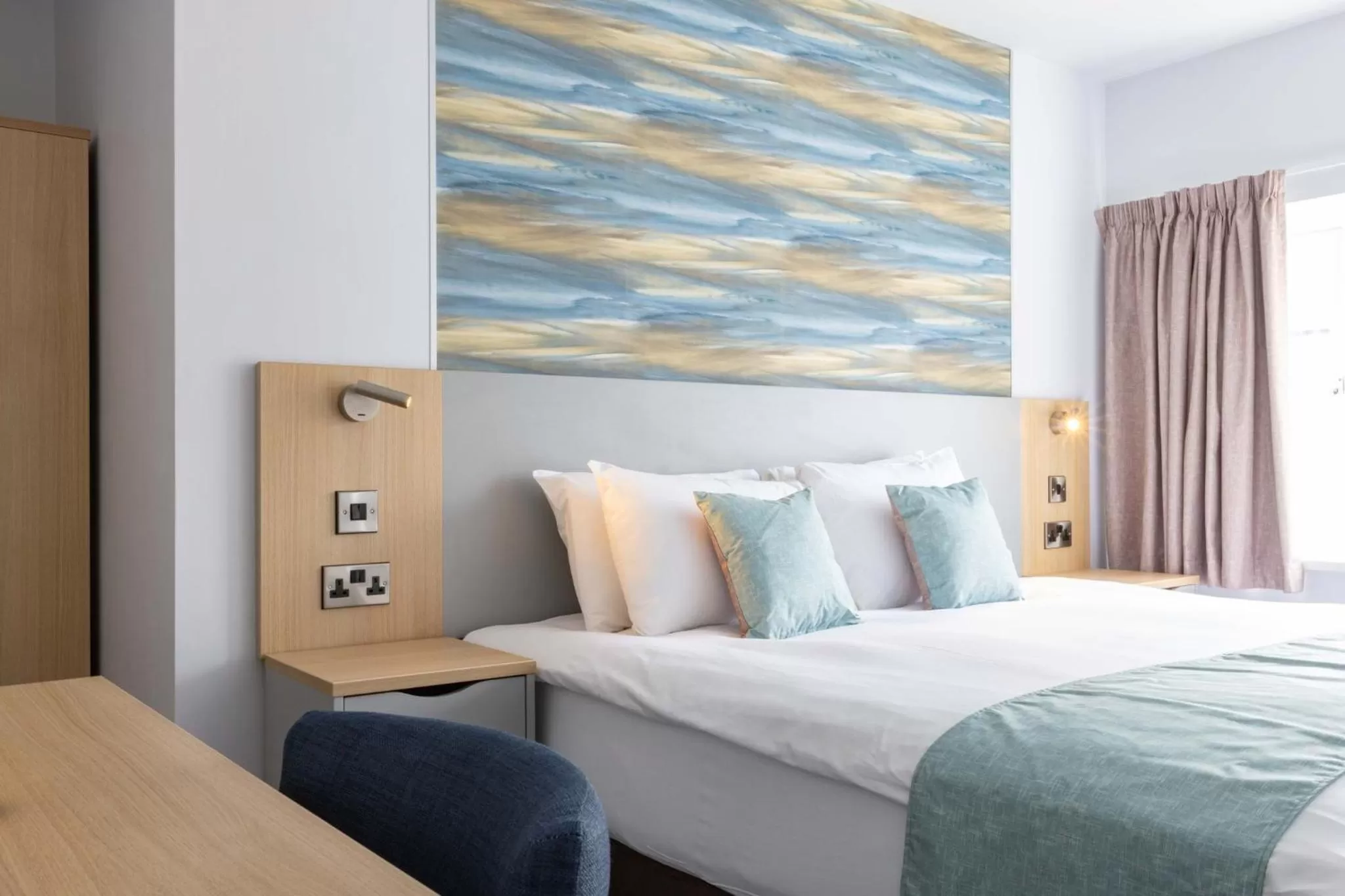 Bed in The Marine Hotel