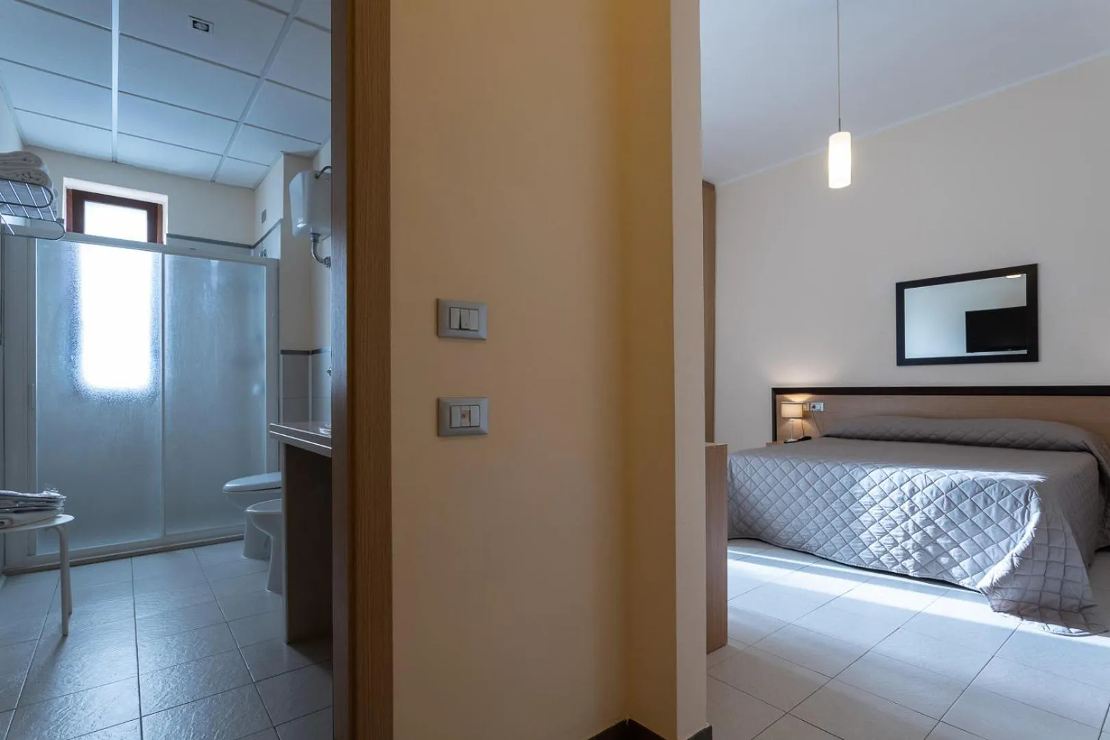 Bed in Club Azzurro Hotel & Resort