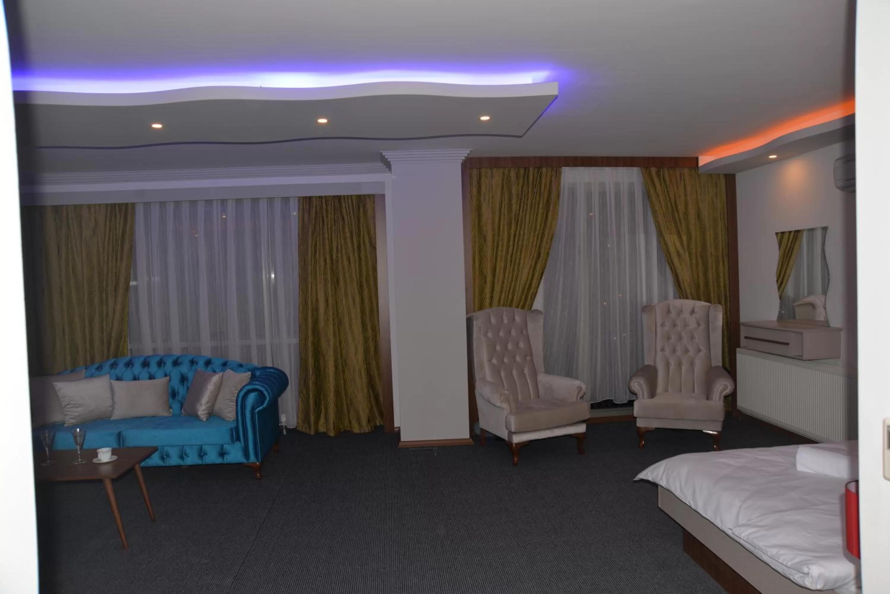 Bed in TEVETOGLU HOTEL