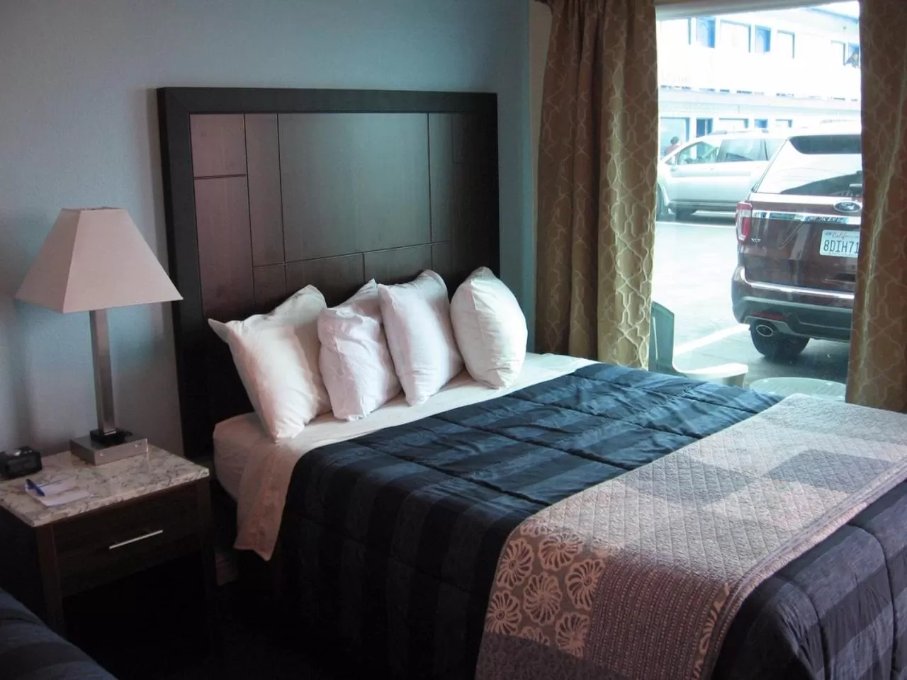 Bed in Dolphin Cove Motel