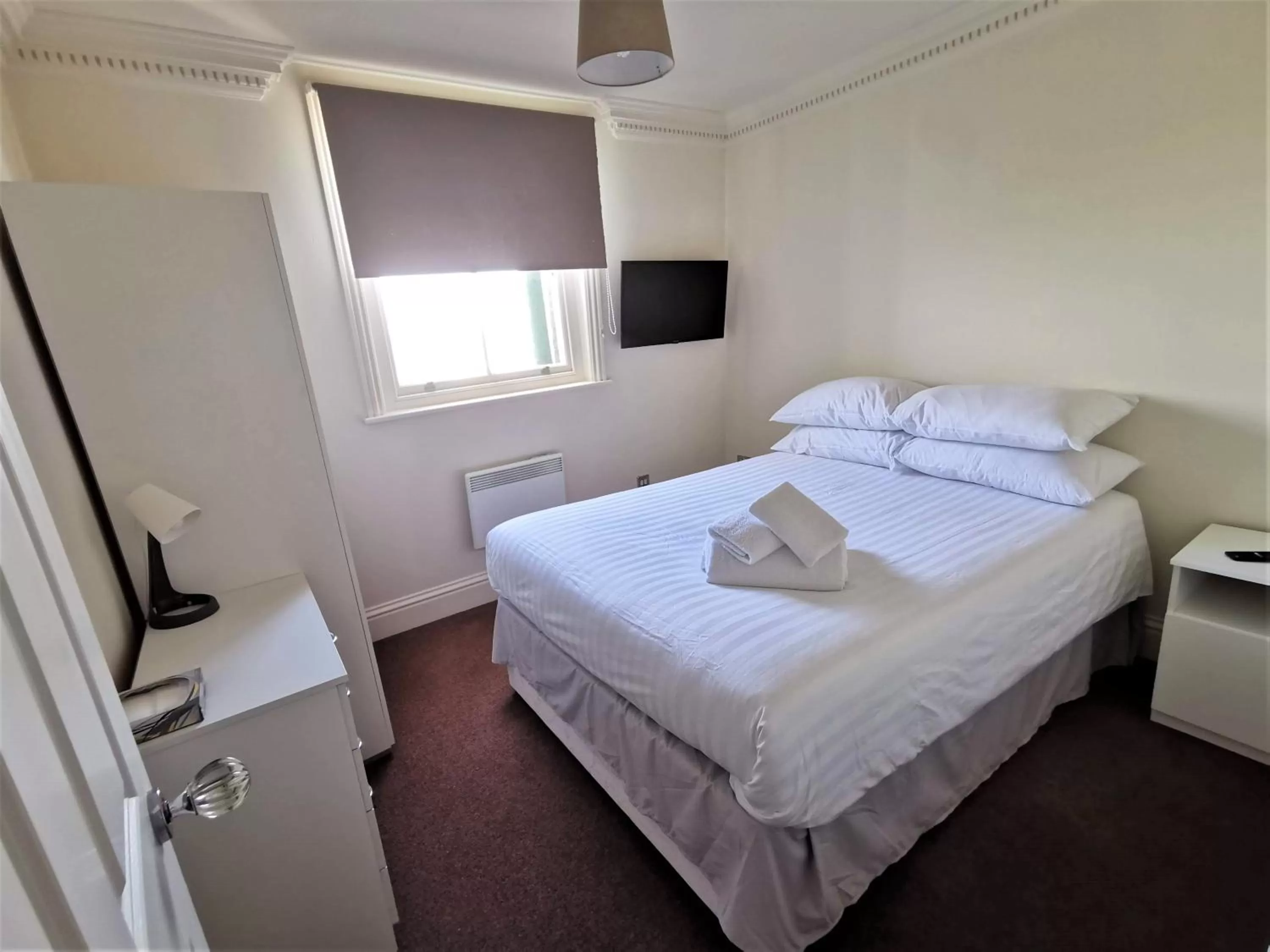 Bed in The Clarendon Royal Community