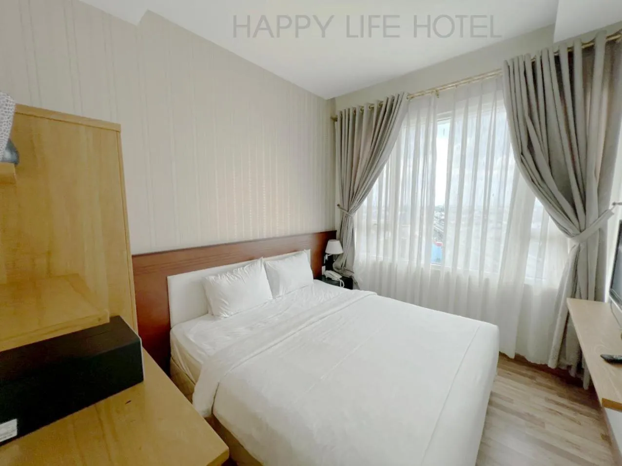 Bed in Happy Life Hotel District 7 Gần SECC