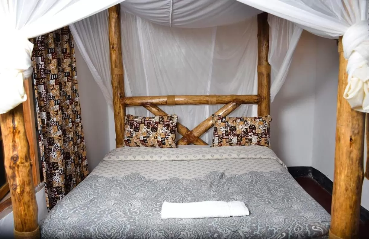 Bed in Charming Eco-Homestay near Kilimanjaro International Airport