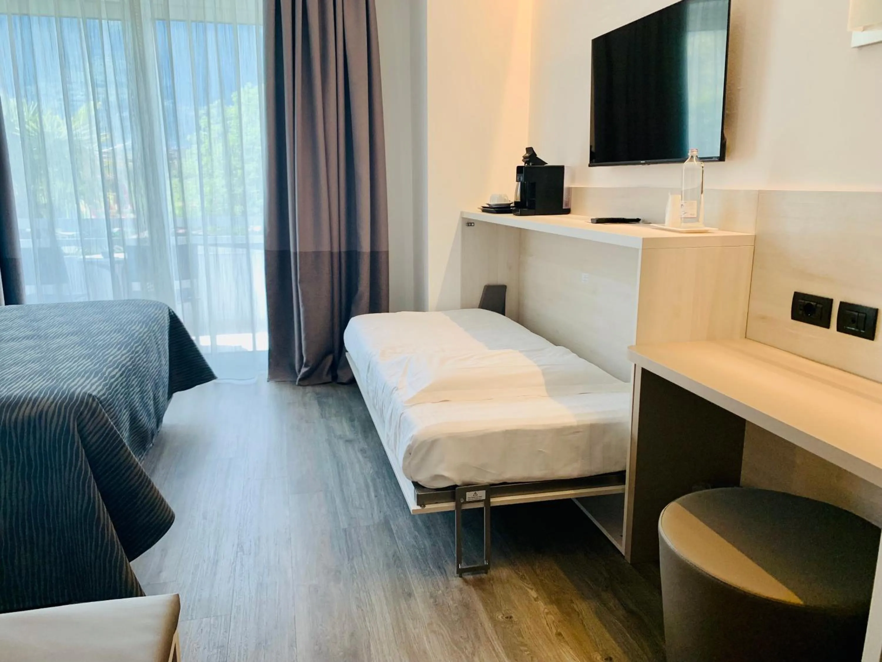 Quadruple Room with Garden View in Hotel Campagnola