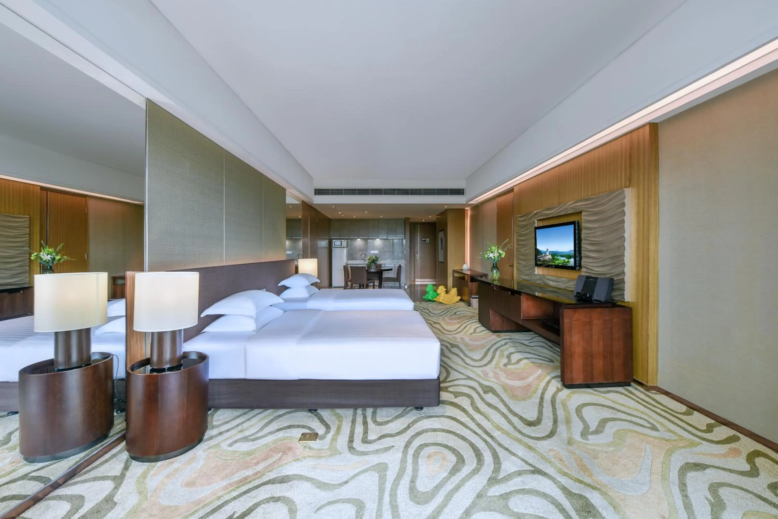 Photo of the whole room, Bed in Mission Hills Hotel Resorts Dongguan