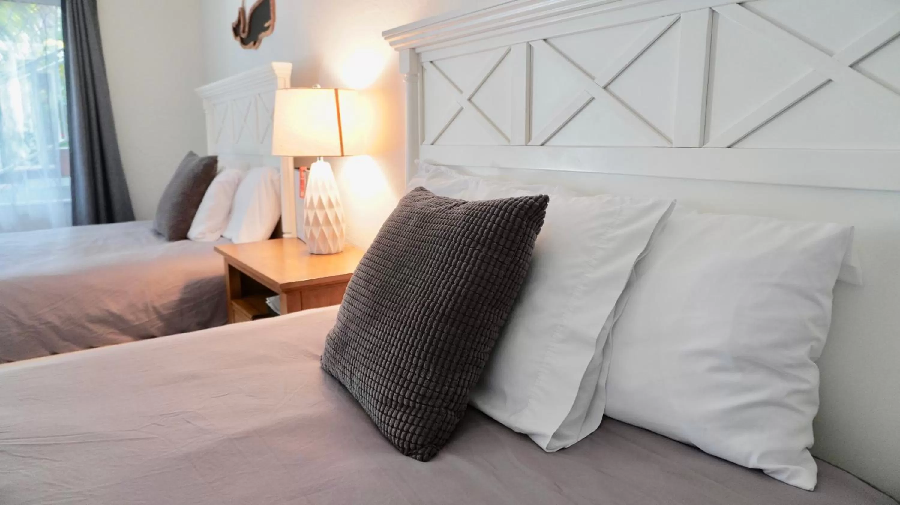 Bed in 4145 By The Sea Inn & Suites